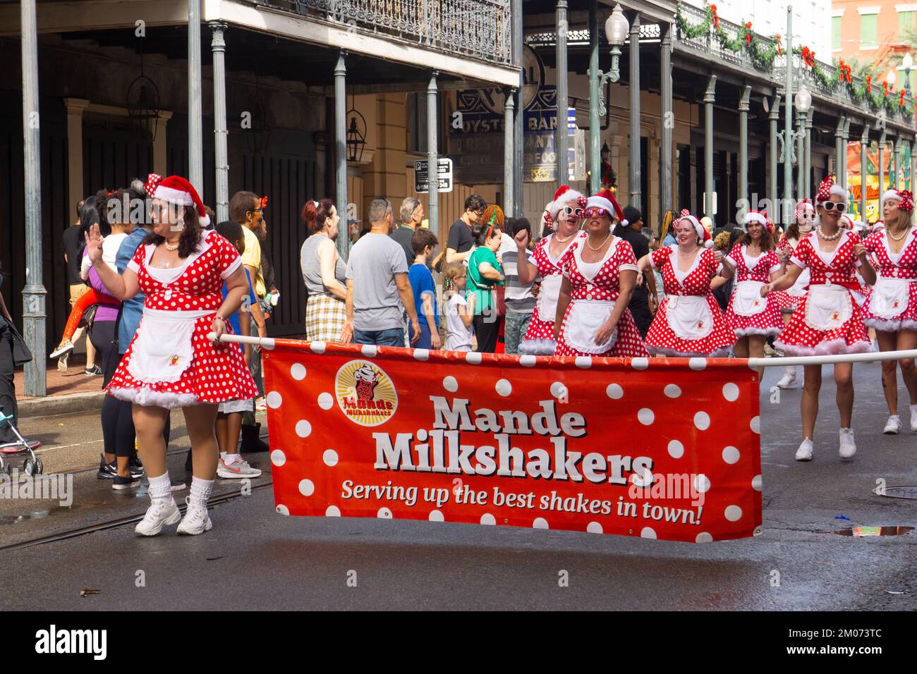 Female marching group in New Orleans' Christmas parade downtown Stock