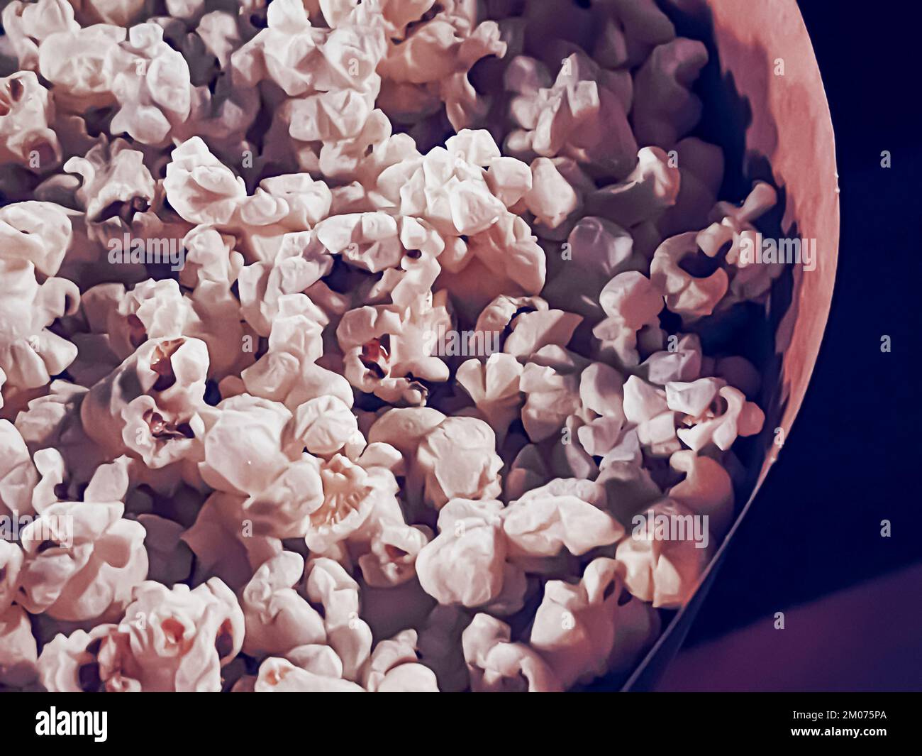 Cinema and entertainment, popcorn box in the movie theatre for tv show streaming service and film industry production branding Stock Photo