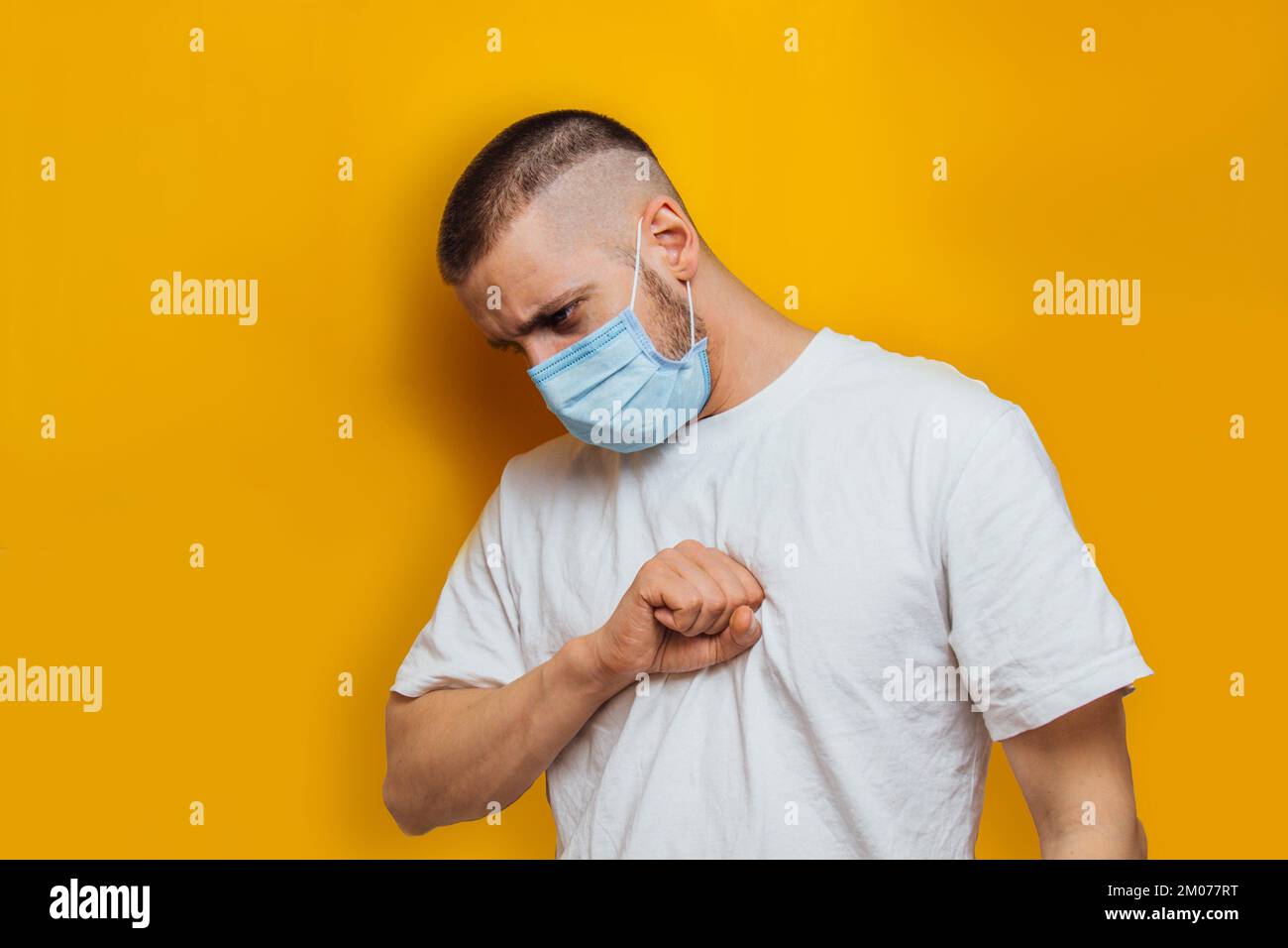 The guy put his fist near his chest. Cough, lung pain, symptoms of the