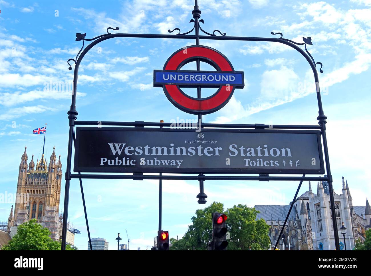 Westminster tube station, underground subway & toilets entrance, in front of the palace of Westminster, Houses of Parliament, London, England, UK, SW1 Stock Photo