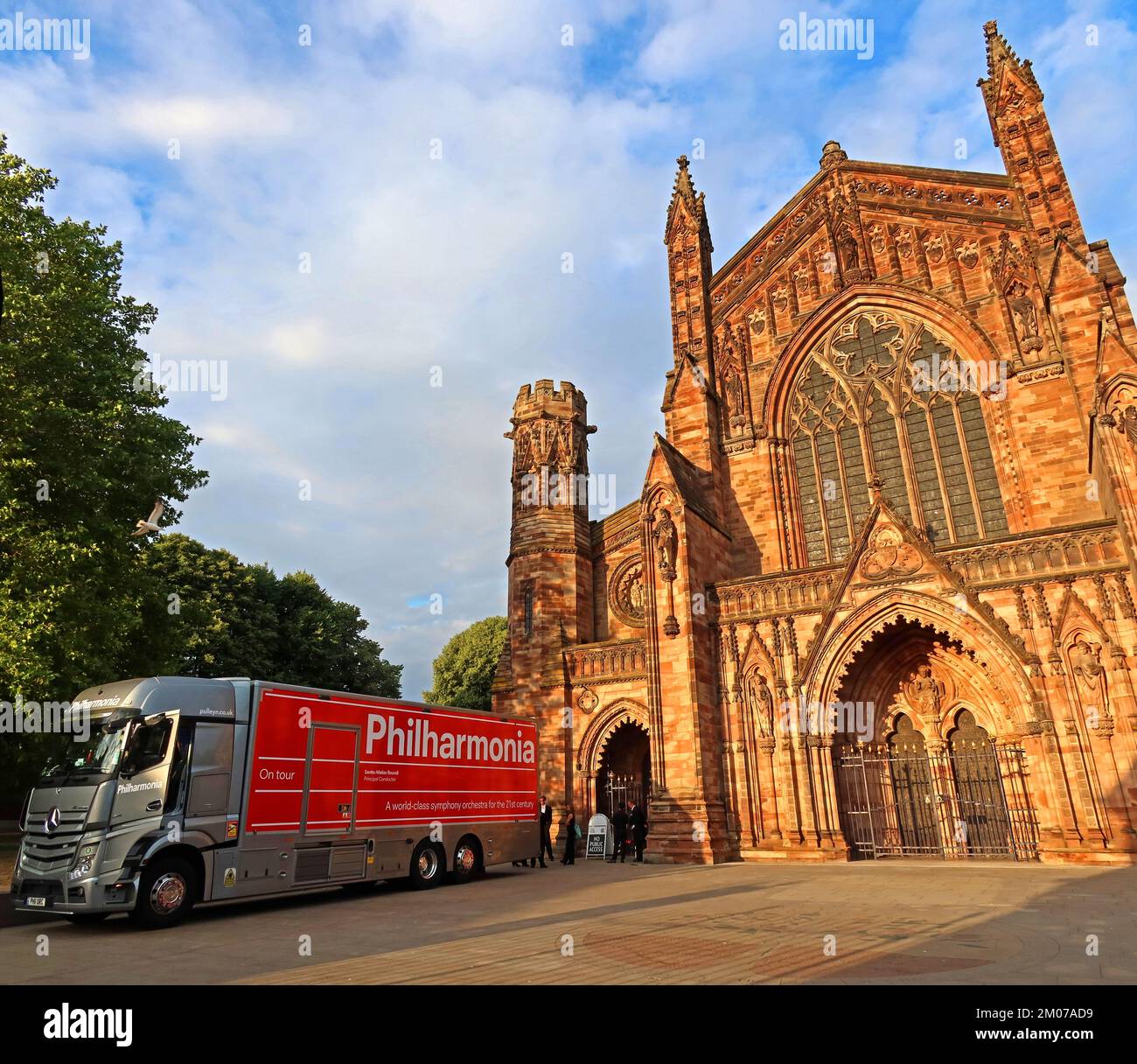 Philharmonia TCF truck at Hereford Cathedral Church at sunset, 5 College Cloisters, Cathedral Close, Hereford, Herefordshire, England, UK, HR1 2NG Stock Photo