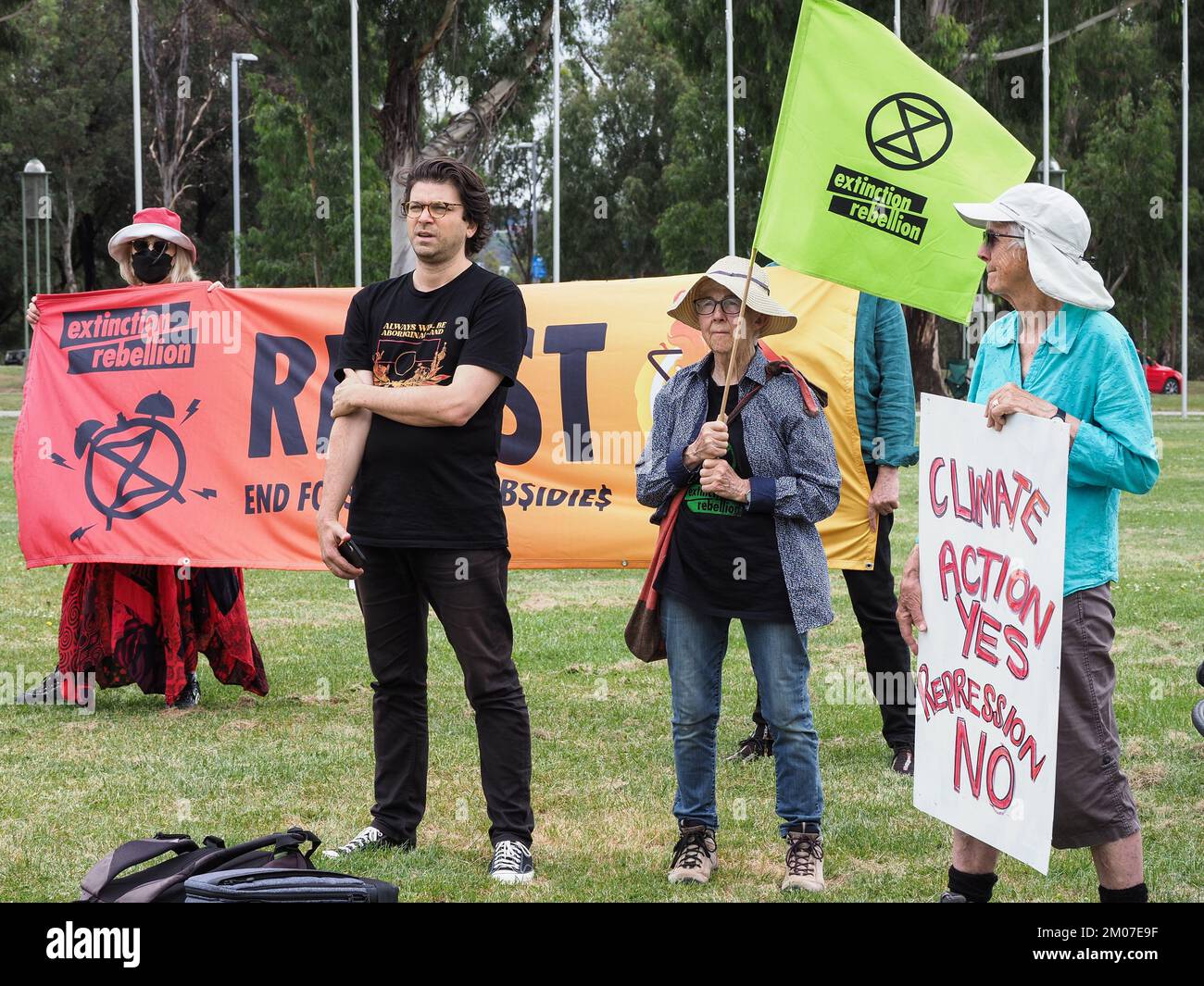 Canberra, Australia. 05th Dec, 2022. Climate protesters from a range of organisations rallied in front of Parliament House to protest the draconian sentence of 15 months prison given to Violet Coco for blocking Sydney Harbour Bridge. Credit: Leo Bild/Alamy Live News Stock Photo