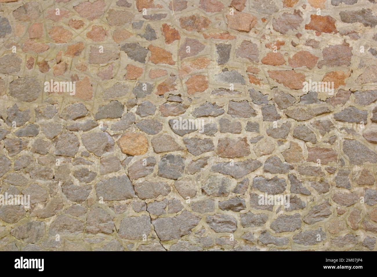 old stone wall close up. background texture. Stock Photo