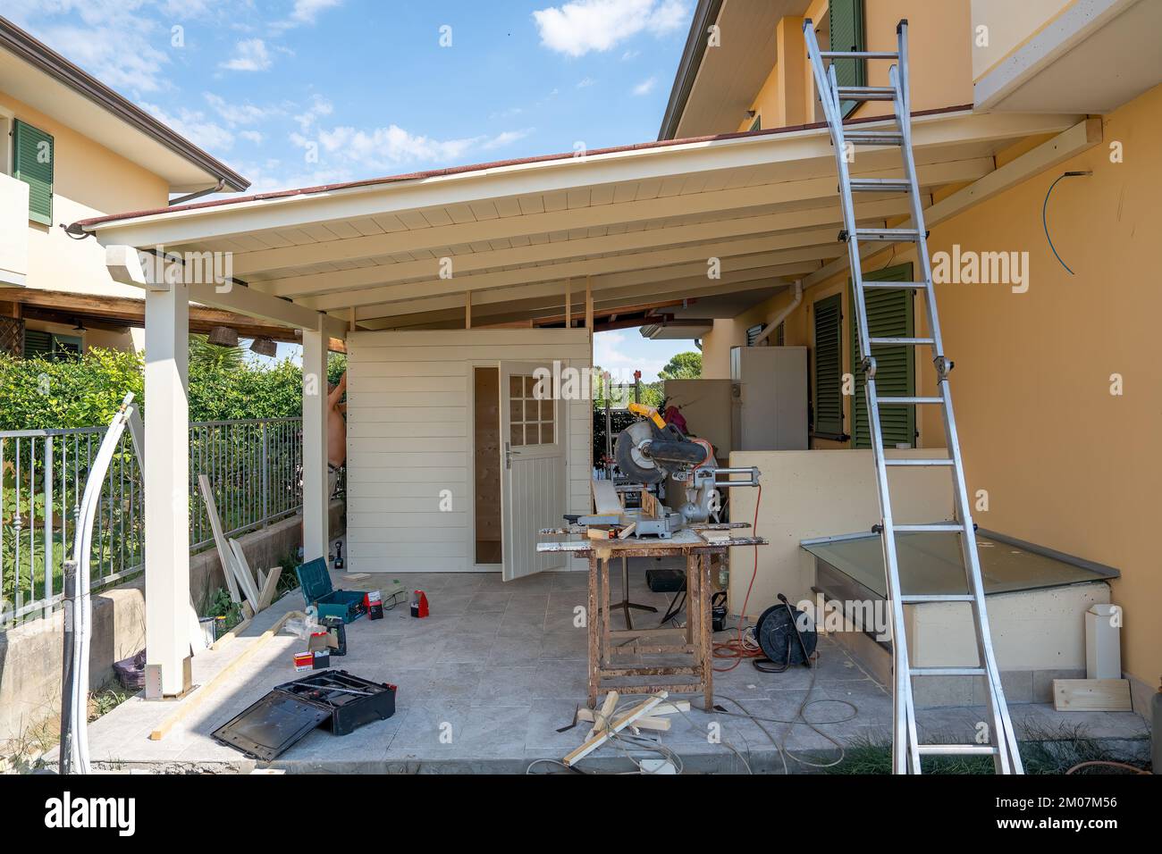 Moving to a new house. Outdoor patio pergola shade structure, patio