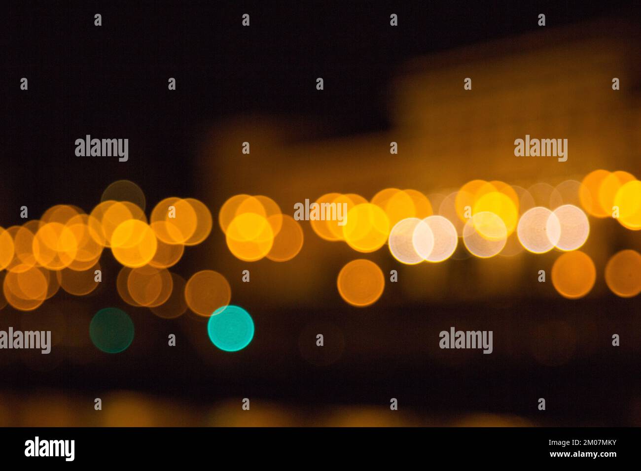 blurry lights of a big city at night. Background for travel photos