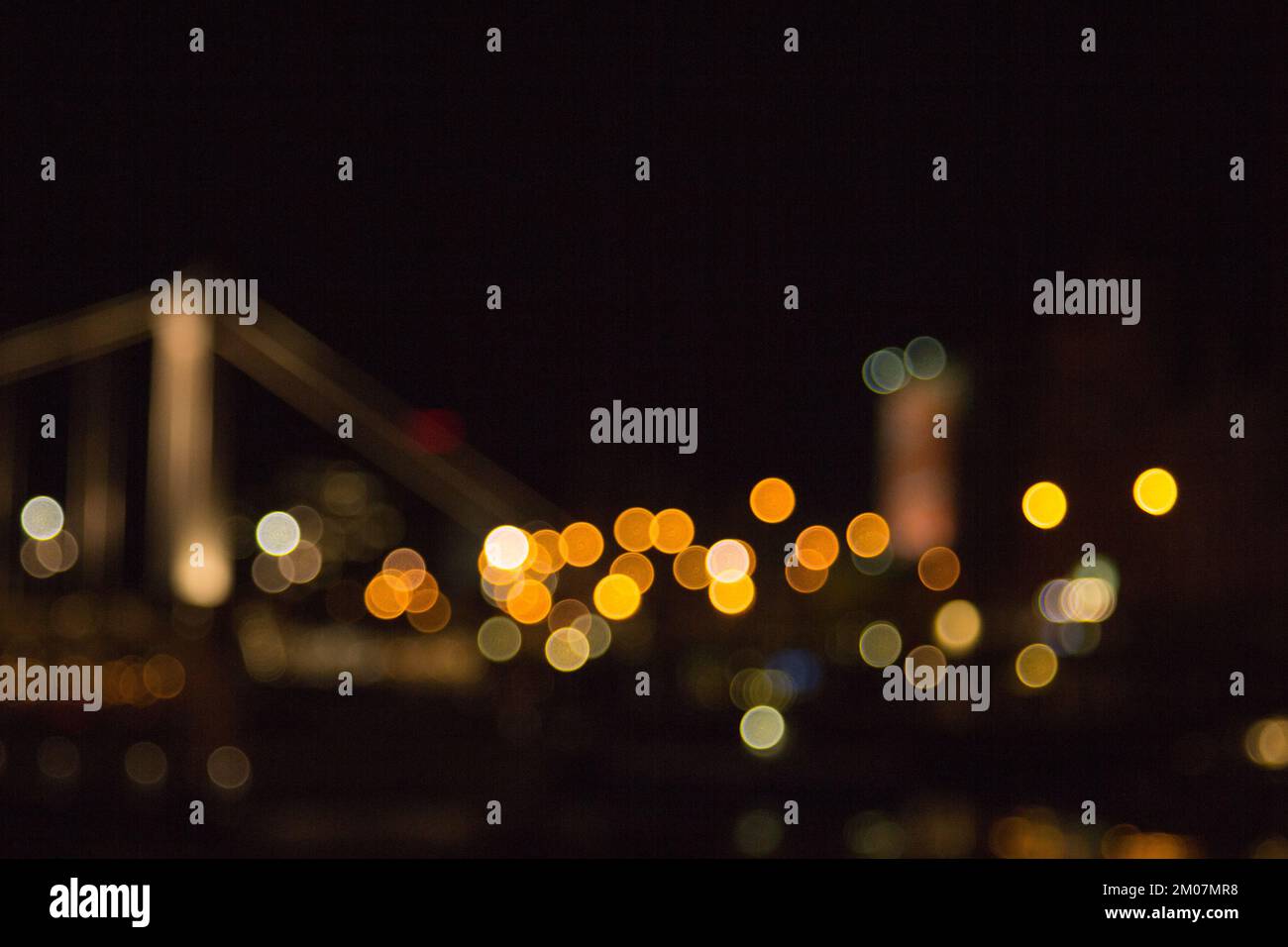 blurry lights of a big city at night. Background for travel photos