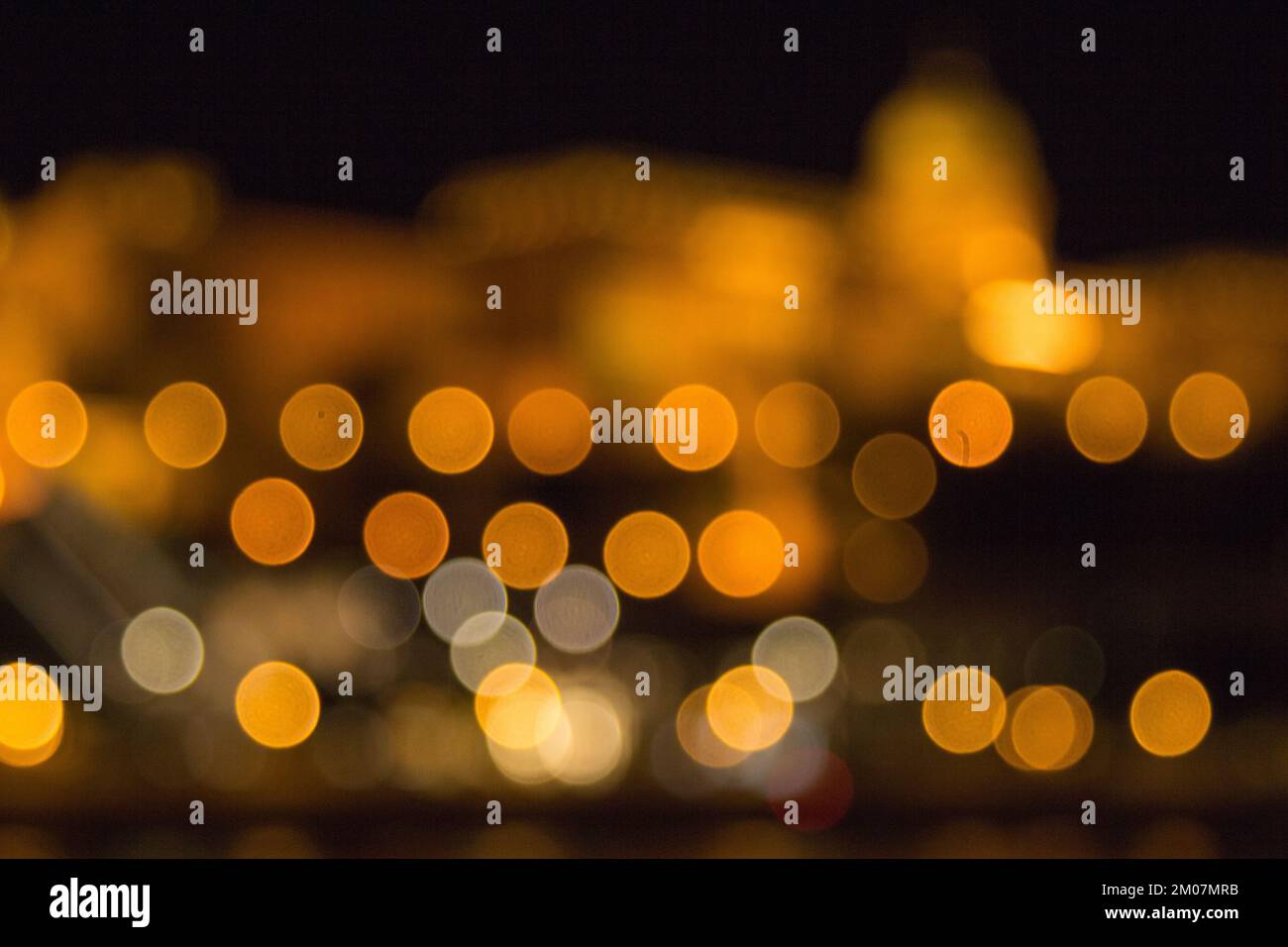 Blurry Lights Of A Big City At Night. Background For Travel Photos 