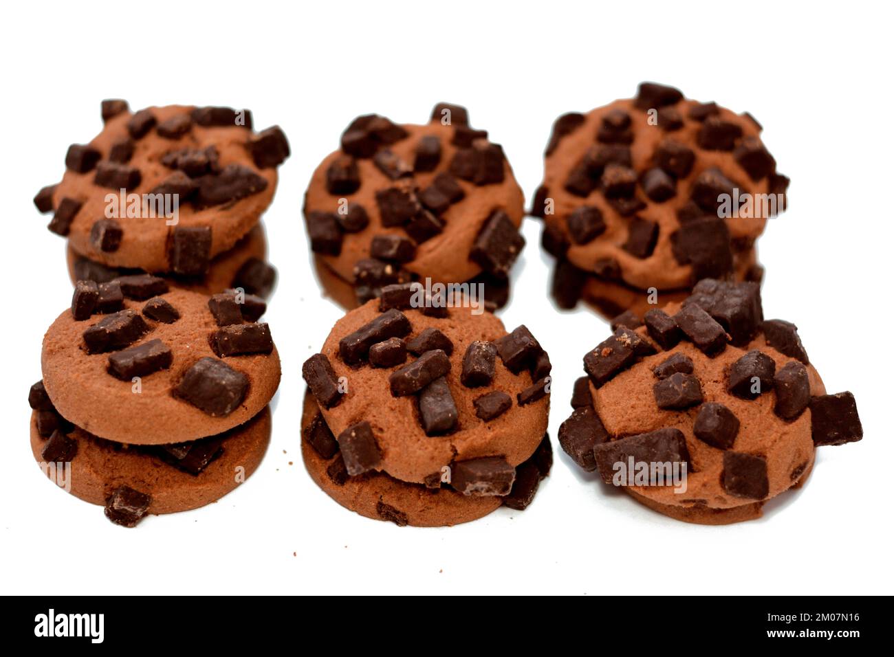 Fresh baked chocolate chip cookies with chocolate pieces, traditional chocolate chip cookies with chunks isolated, delicious pastries with choco chips Stock Photo