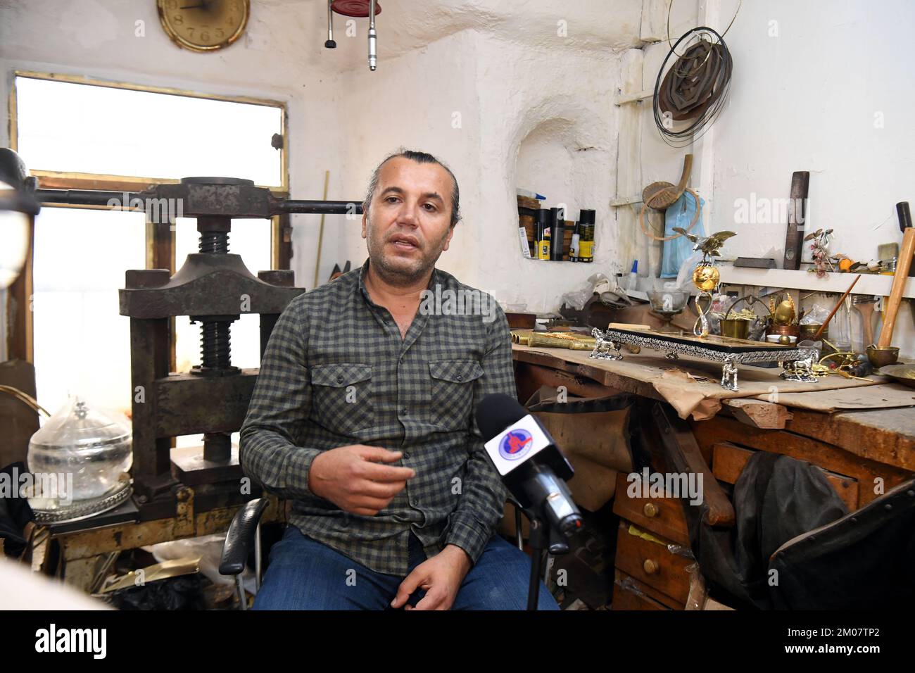 Istanbul, T¨¹rkiye. 1st Dec, 2022. Sabri Demirci, an artisan and owner of a silver shop, speaks in an interview with Xinhua at his atelier in Istanbul, T¨¹rkiye, Dec. 1, 2022. TO GO WITH 'Feature: Turkish artisan introduces Qatari culture through design' Credit: Shadati/Xinhua/Alamy Live News Stock Photo