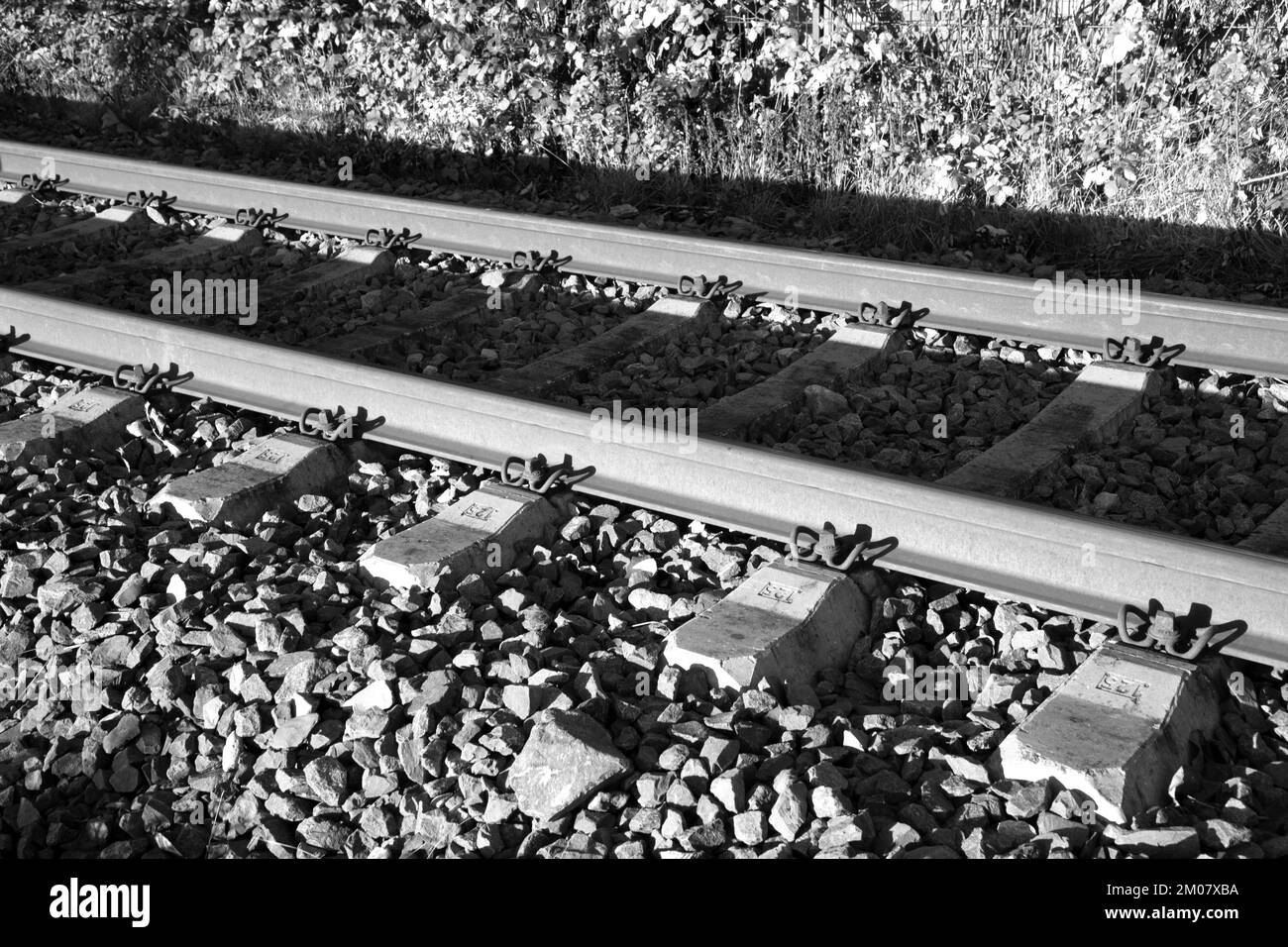 rusty rails in detail in sunset color Stock Photo - Alamy