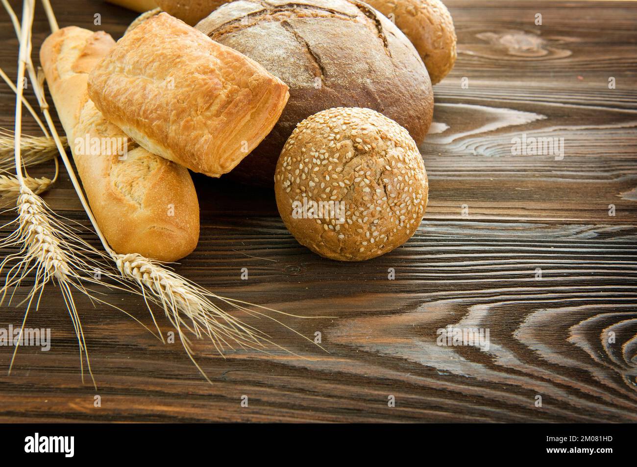 Fresh baked rustic breads on a table Stock Photo