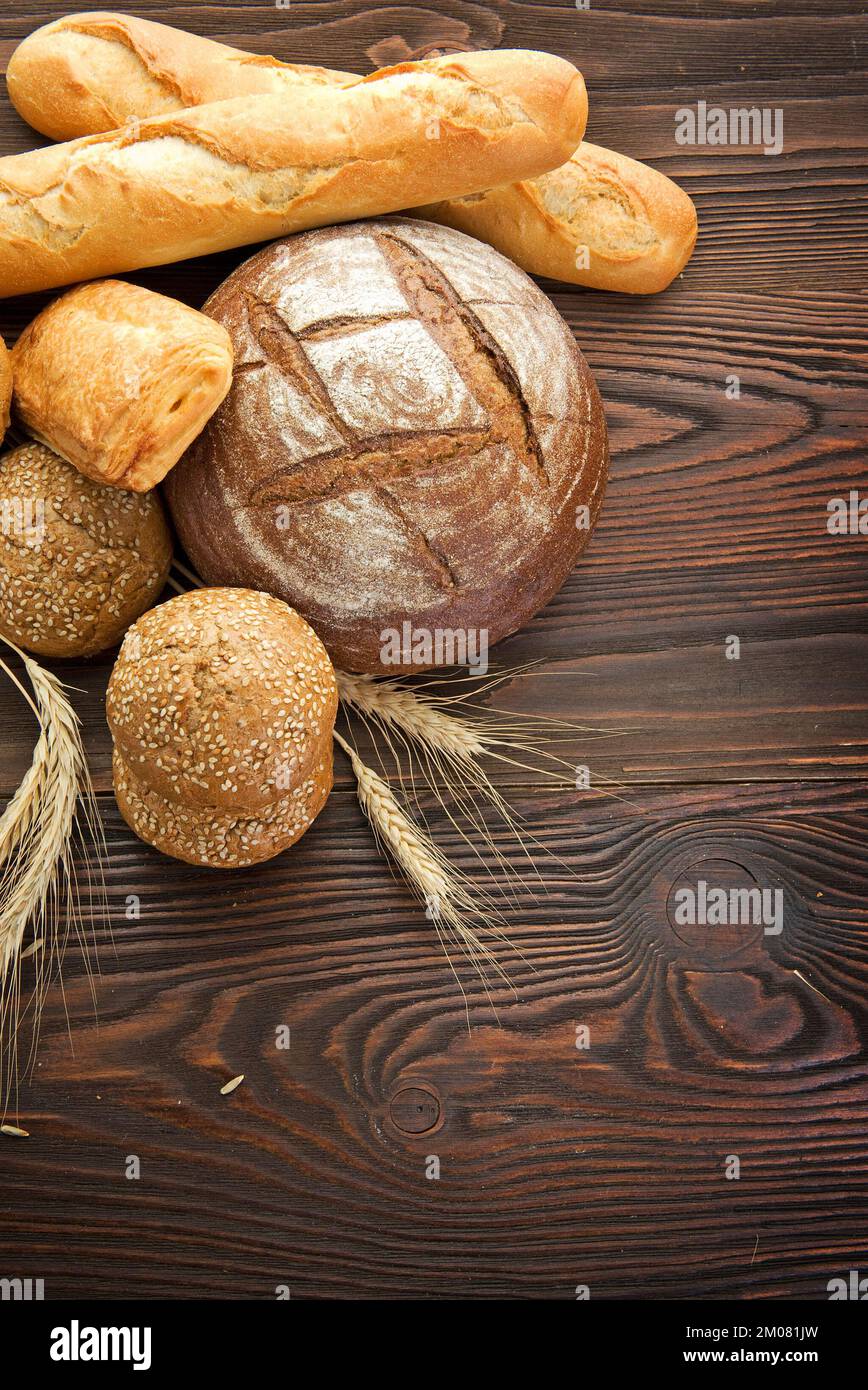 Fresh baked rustic breads on a table Stock Photo