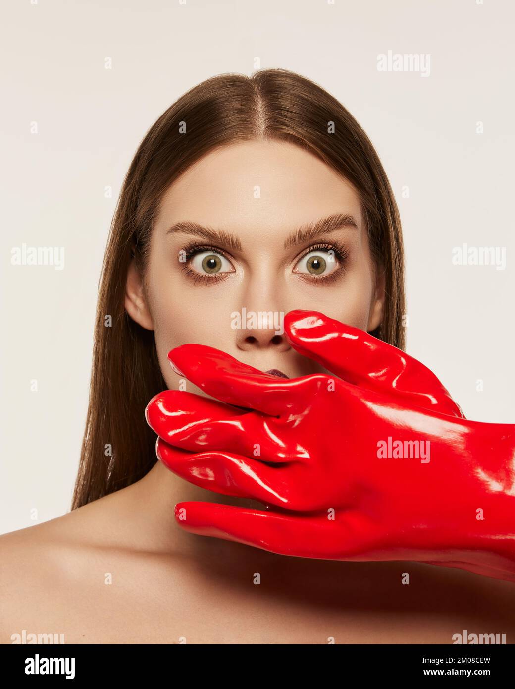 Portrait of beautiful young woman with straight brown hair and dark