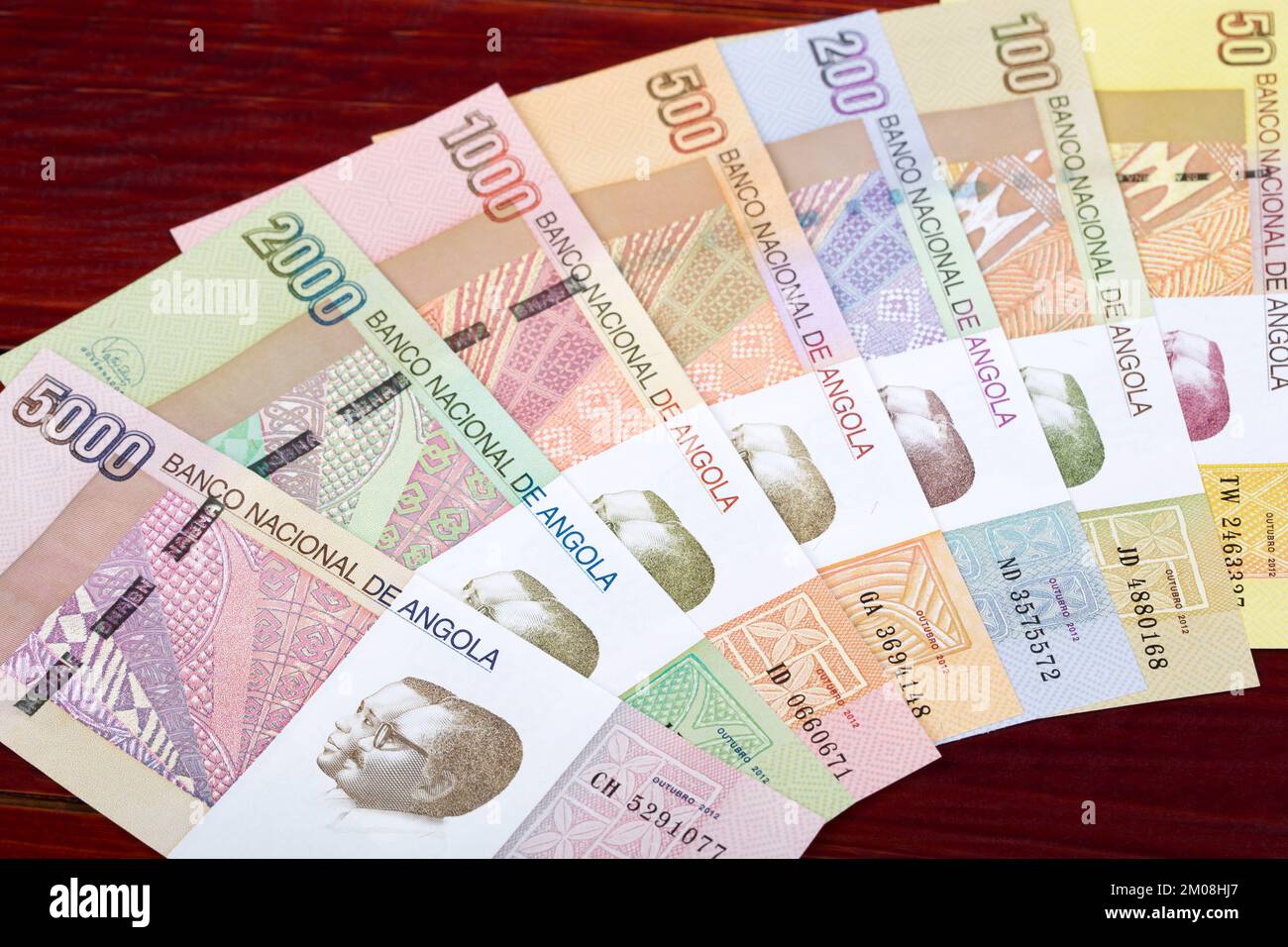 Angolan money - kwanza a business background Stock Photo - Alamy