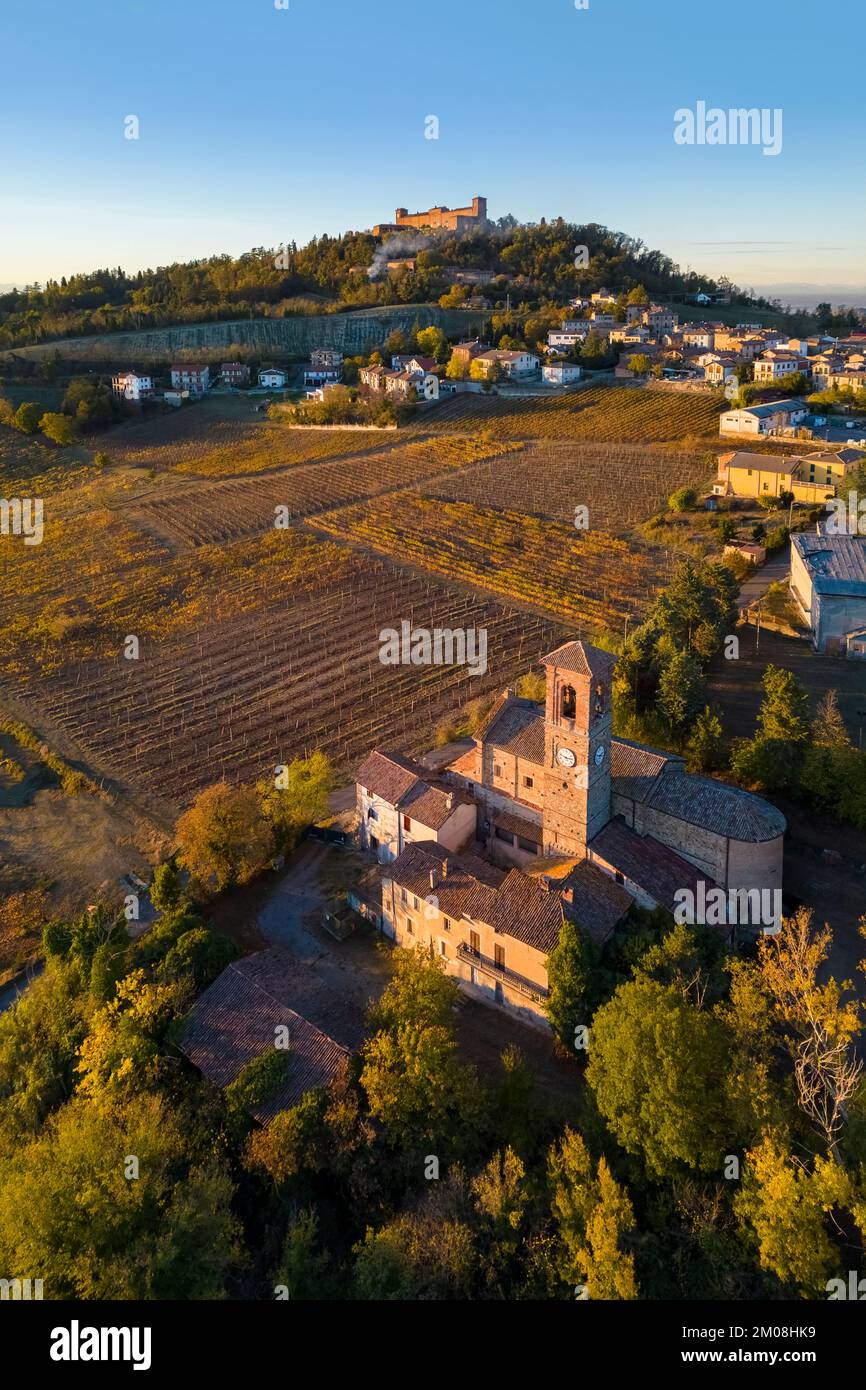 Aerial view of the church of Sant'Antonino Martire in autumn. Montalto Pavese, Oltrepo Pavese, Pavia district, Lombardy, Italy. Stock Photo