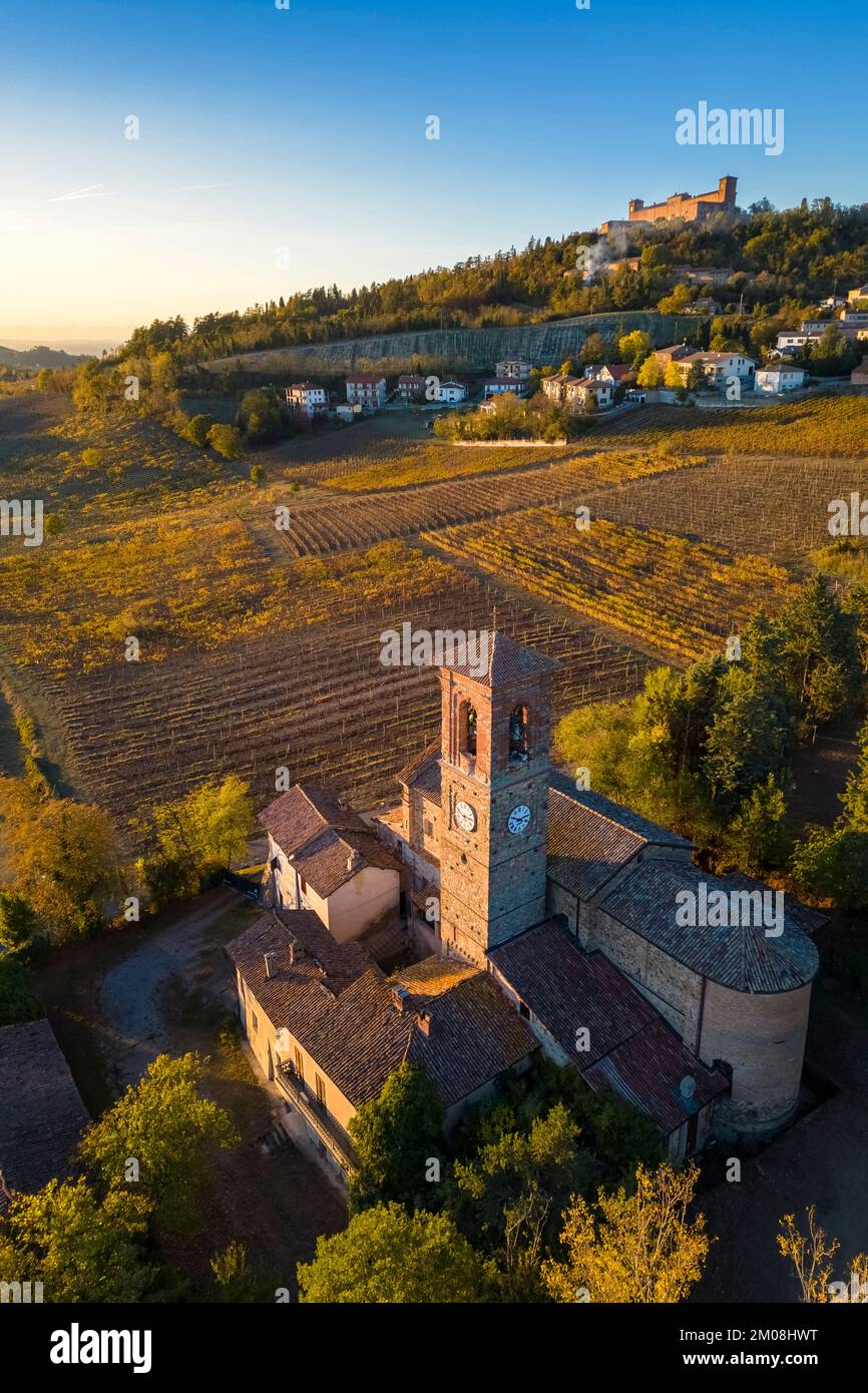 Aerial view of the church of Sant'Antonino Martire in autumn. Montalto Pavese, Oltrepo Pavese, Pavia district, Lombardy, Italy. Stock Photo