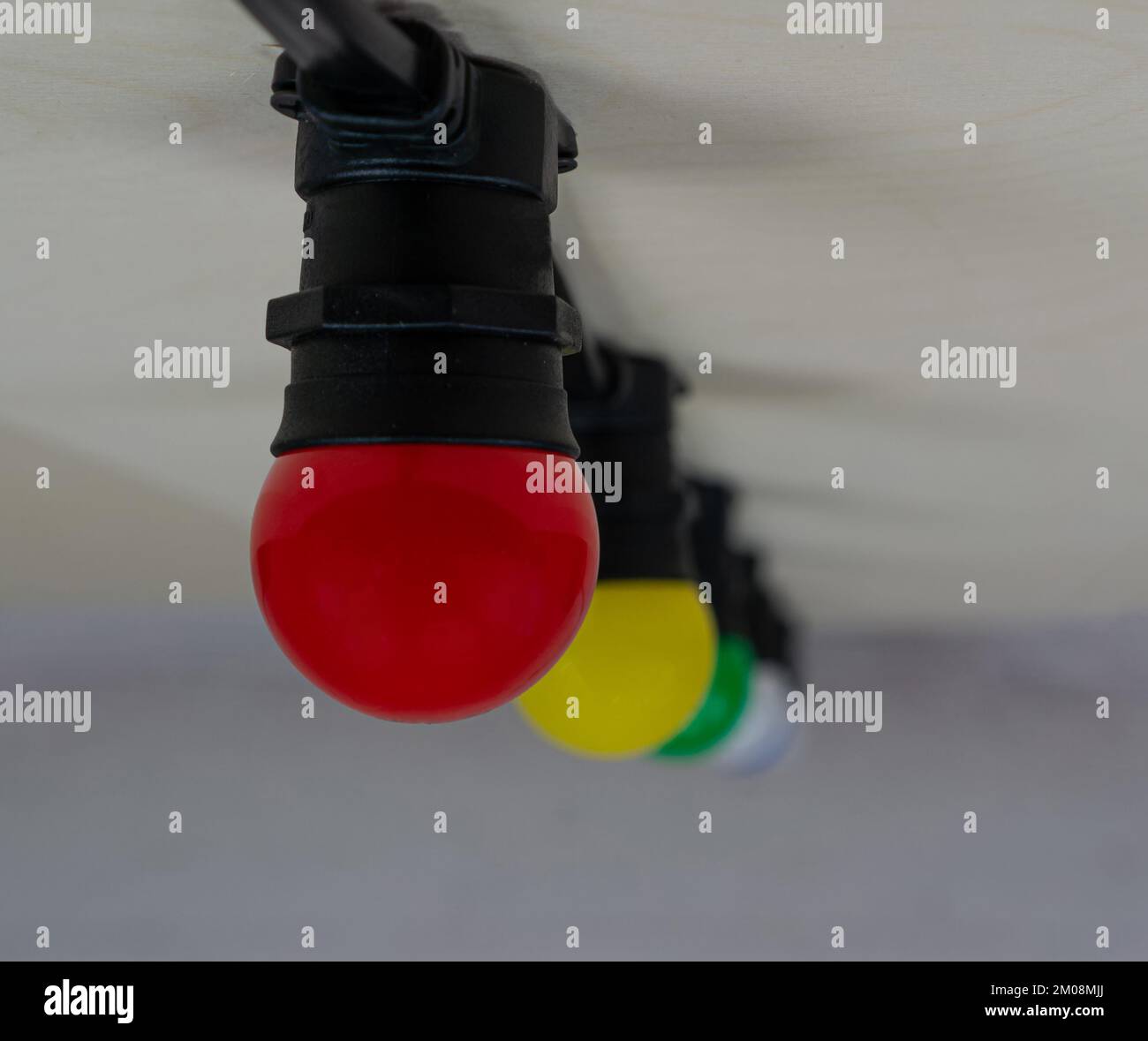 Christmas garland Beltlight with different colors lamps in row upside