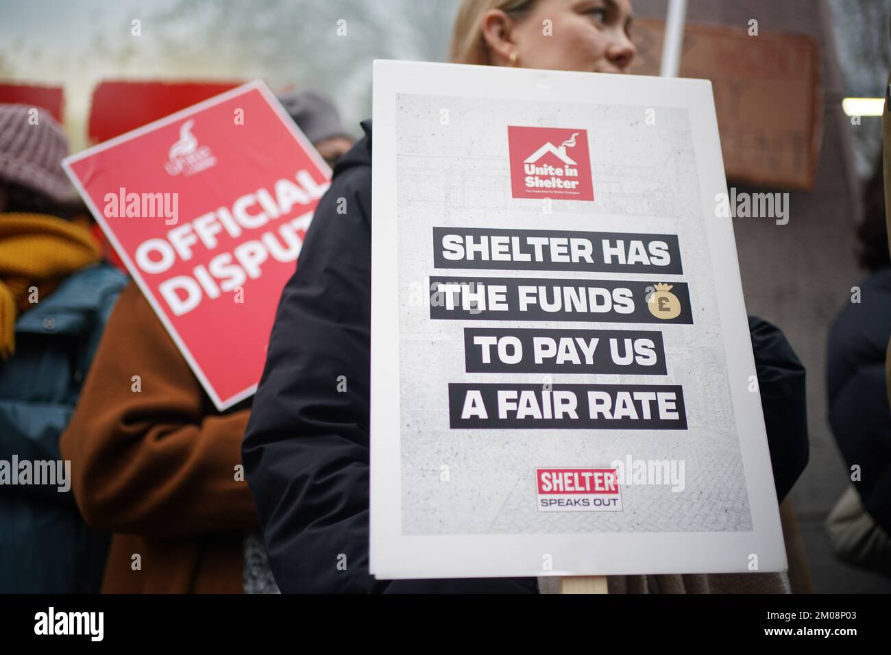 Members of the Unite union who work for housing and homeless charity Shelter on the picket line
