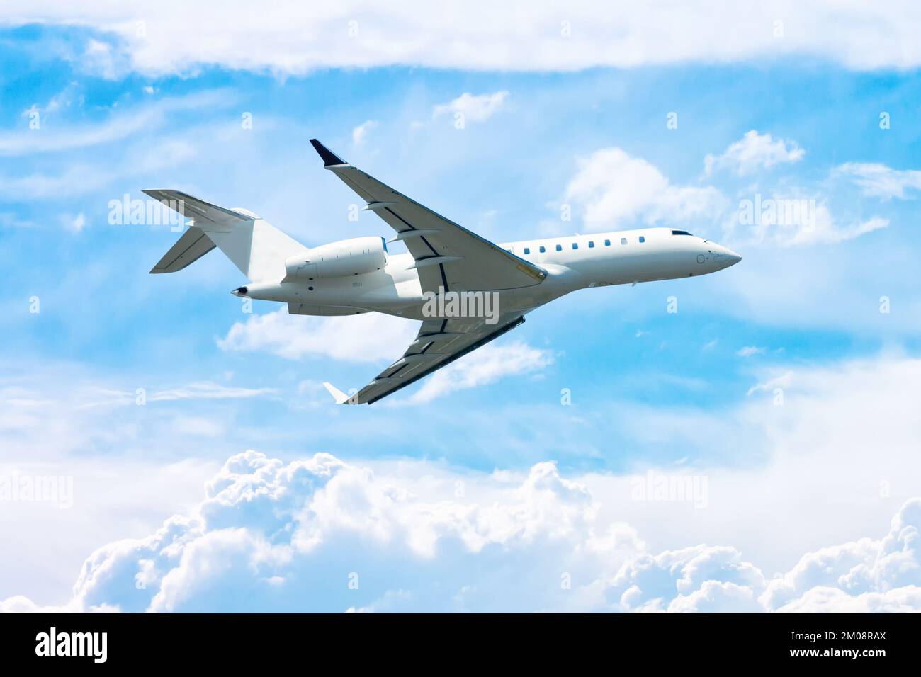 White modern executive airplane fly in the sky Stock Photo - Alamy
