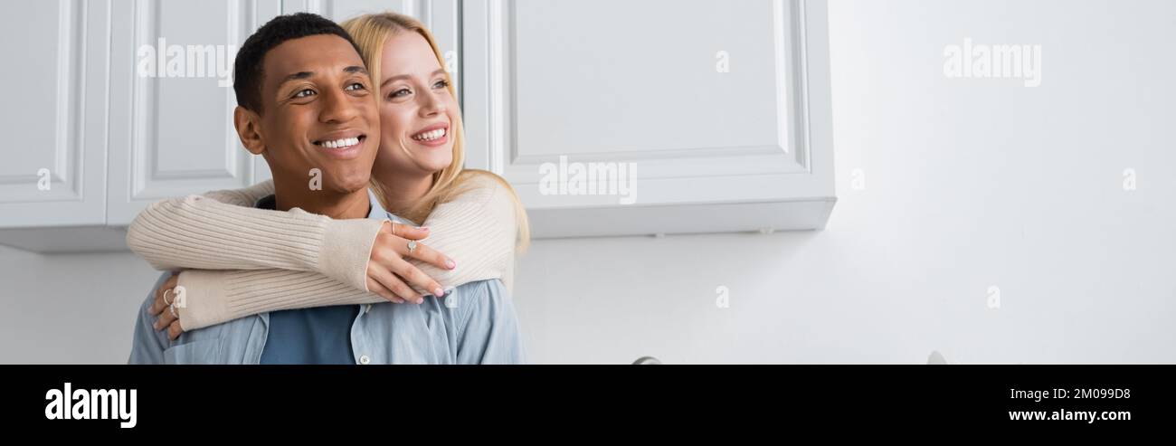 Beautiful cheerful caucasian woman hugging hi-res stock photography and ...