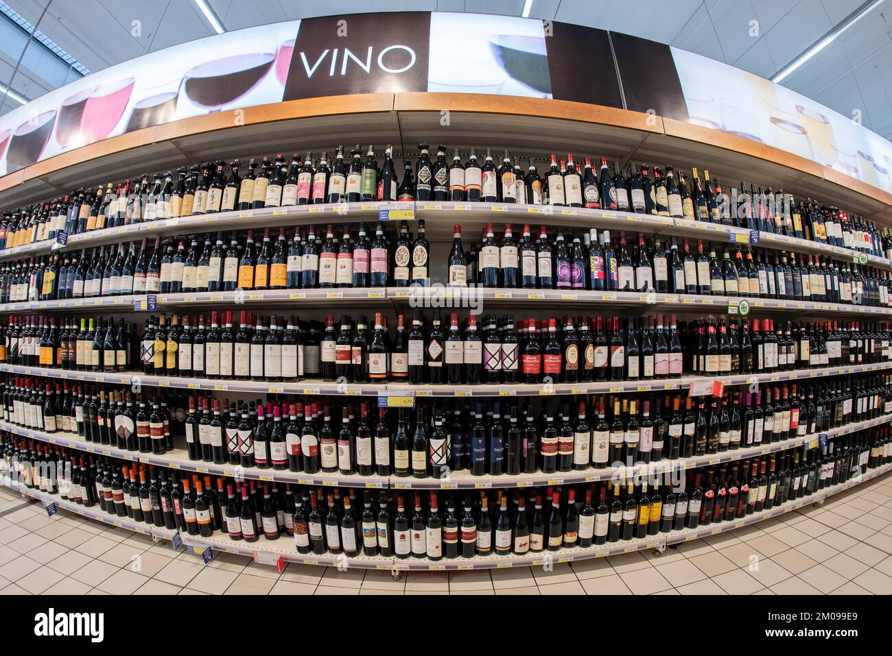Cuneo, Italy November 30, 2022 Shelves with display of bottles of