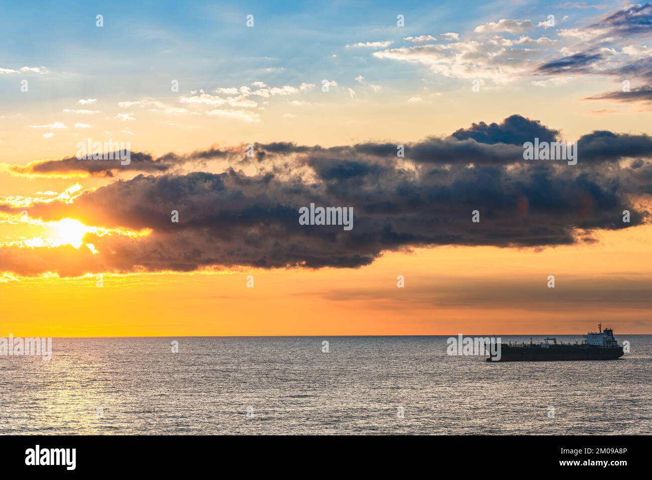 Oil Tanker Ship at Mediterranean Sea at sunrise, Barcelona, Spain, Europe Stock Photo