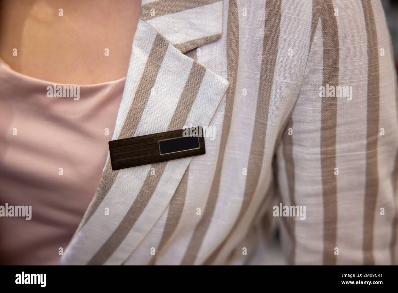Female wearing beige top hi-res stock photography and images - Alamy
