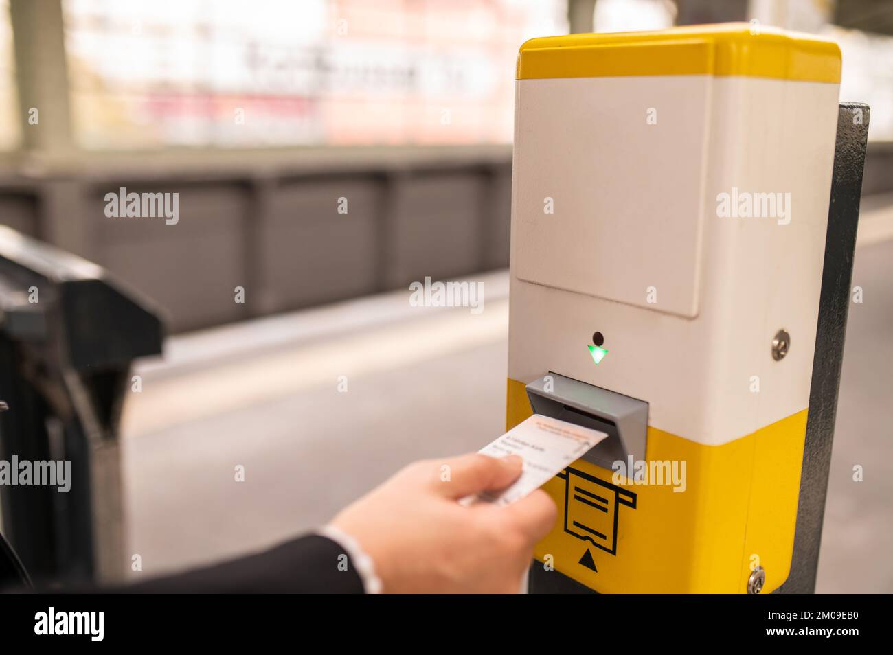 Close up of a woman hand taking a ticket Stock Photo