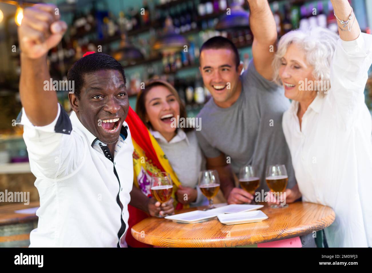 Happy diverse group celebrating Spain Stock Photo Alamy