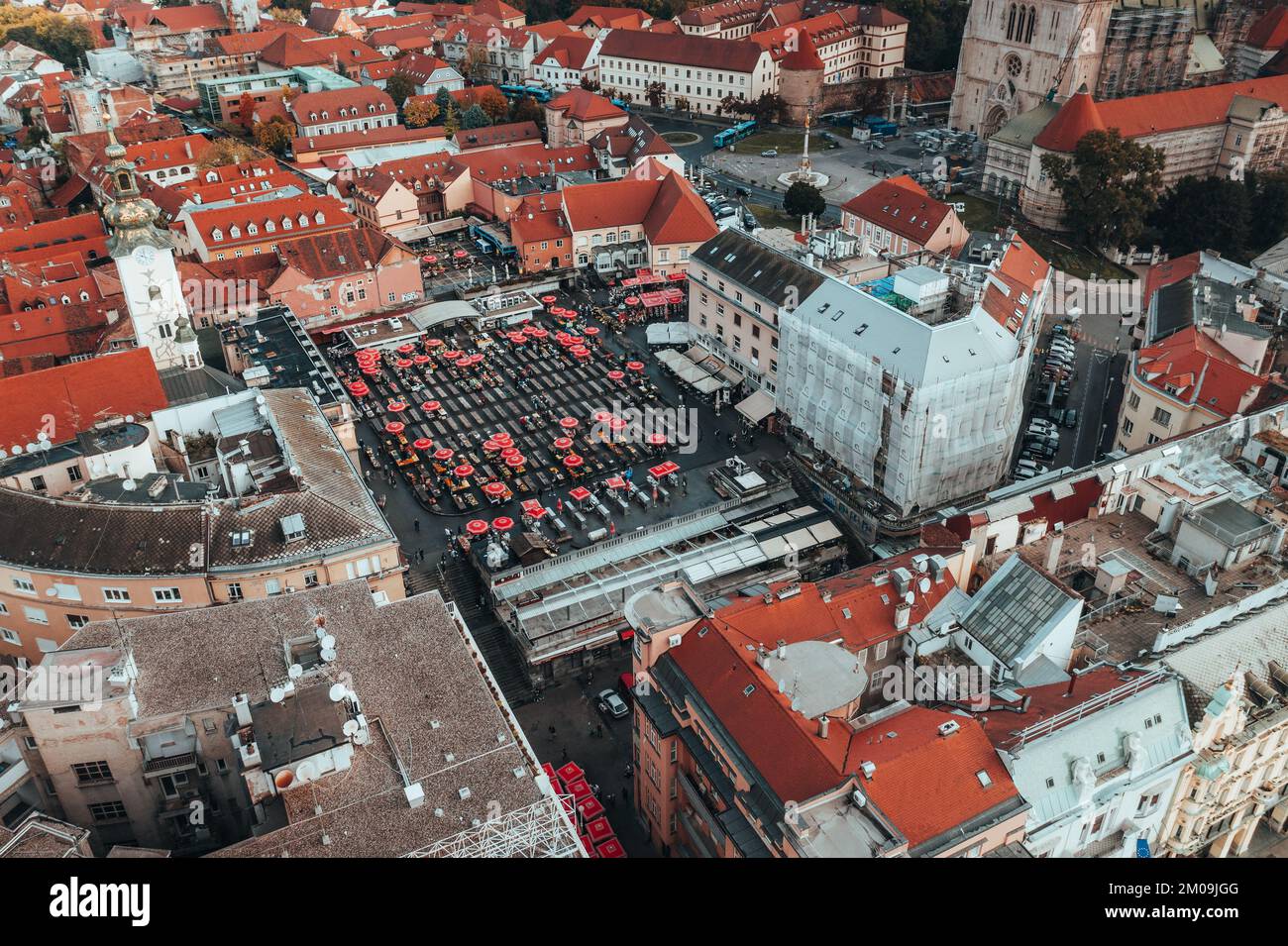 Top down aerial view over the market in the city center and the old