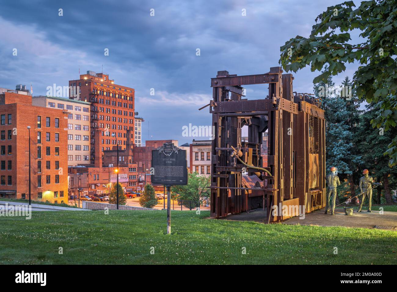 YOUNGSTOWN, OHIO - AUGUST 7, 2019:  Downtown Youngstown with the Little Steel Strike of 1937 monument and memorial at twilight. Stock Photo