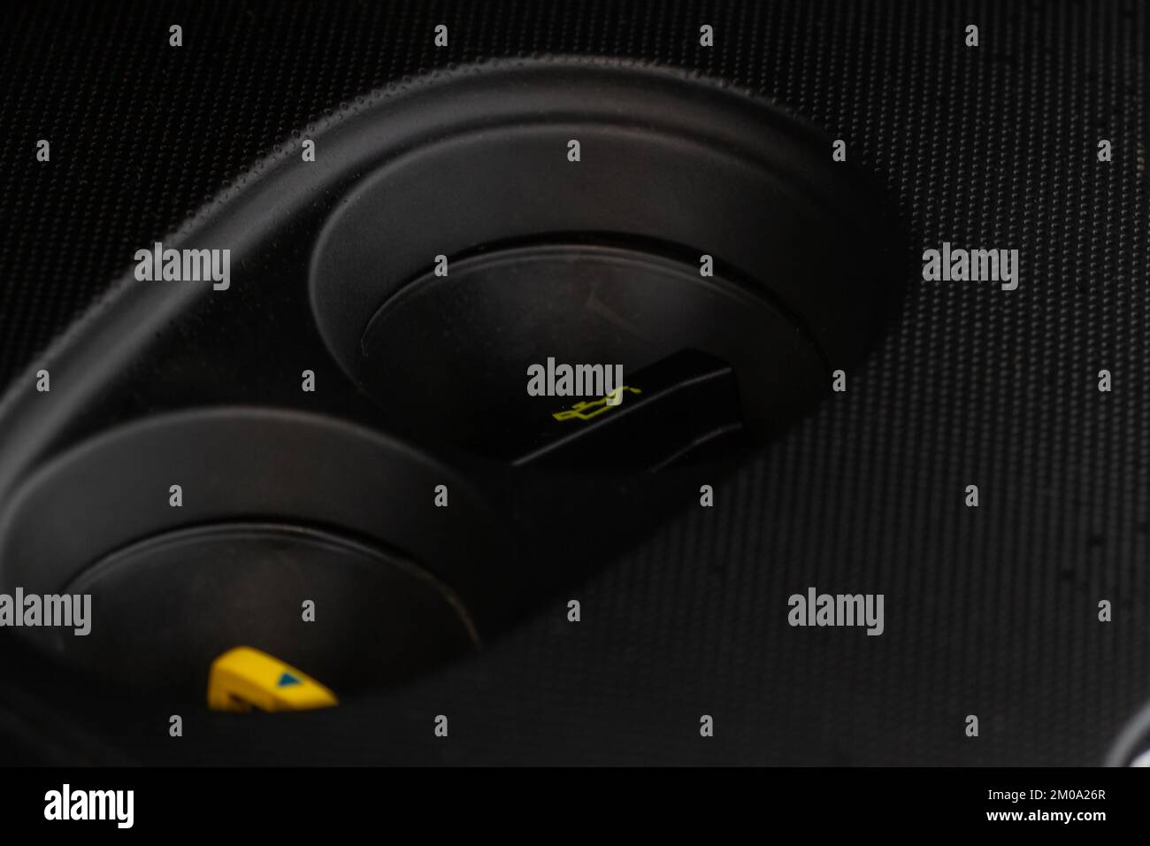 Closeup oil cap in engine room of a modern car. Oil cap on the car