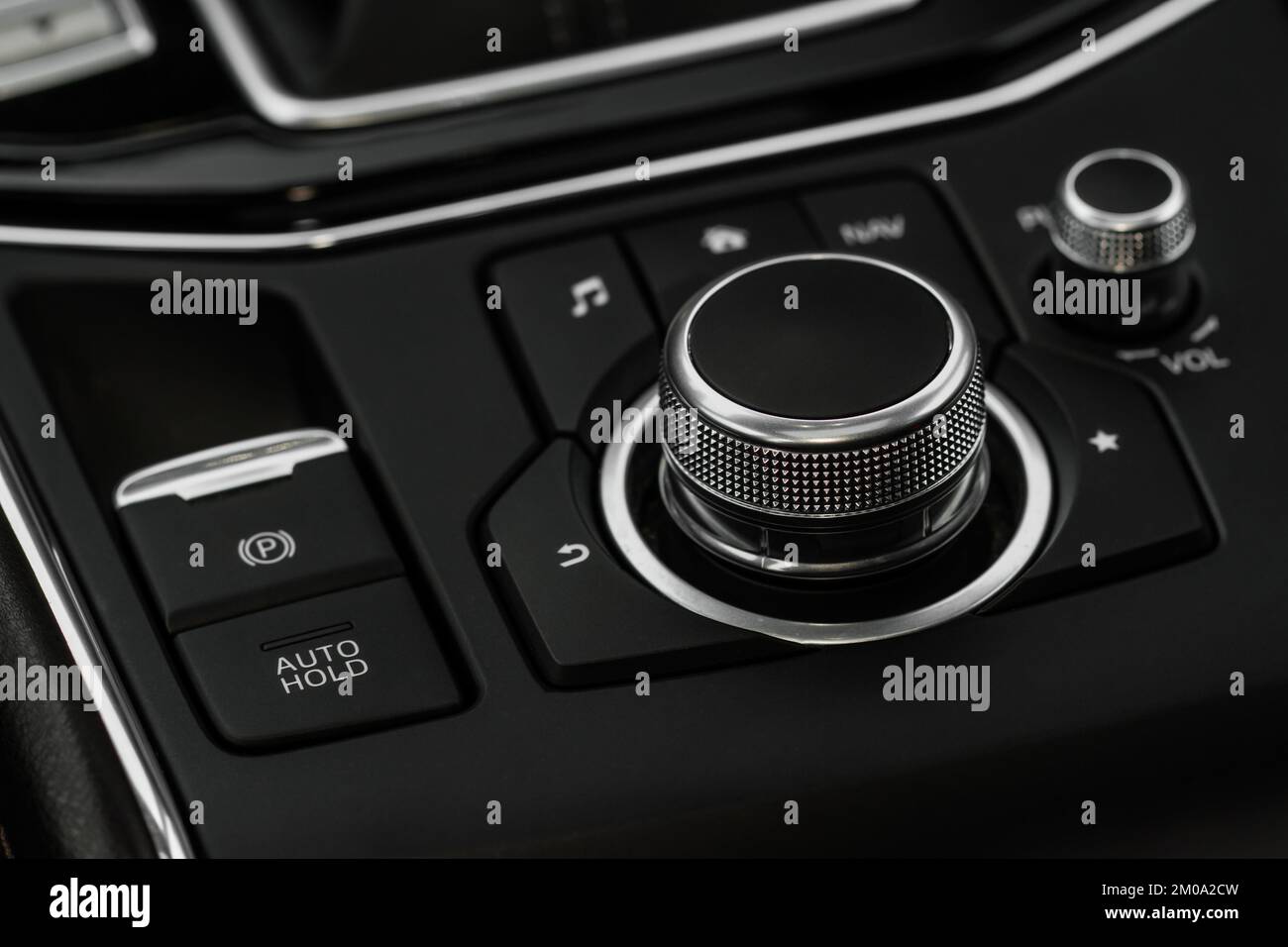 Car media controller close up. Modern car media and navigation control ...