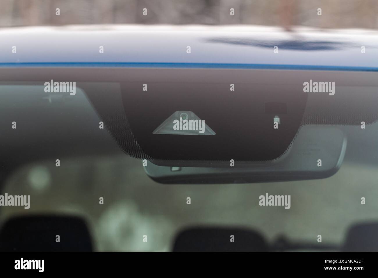 Windshield rain and light sensors of modern car. Car rain sensor Stock