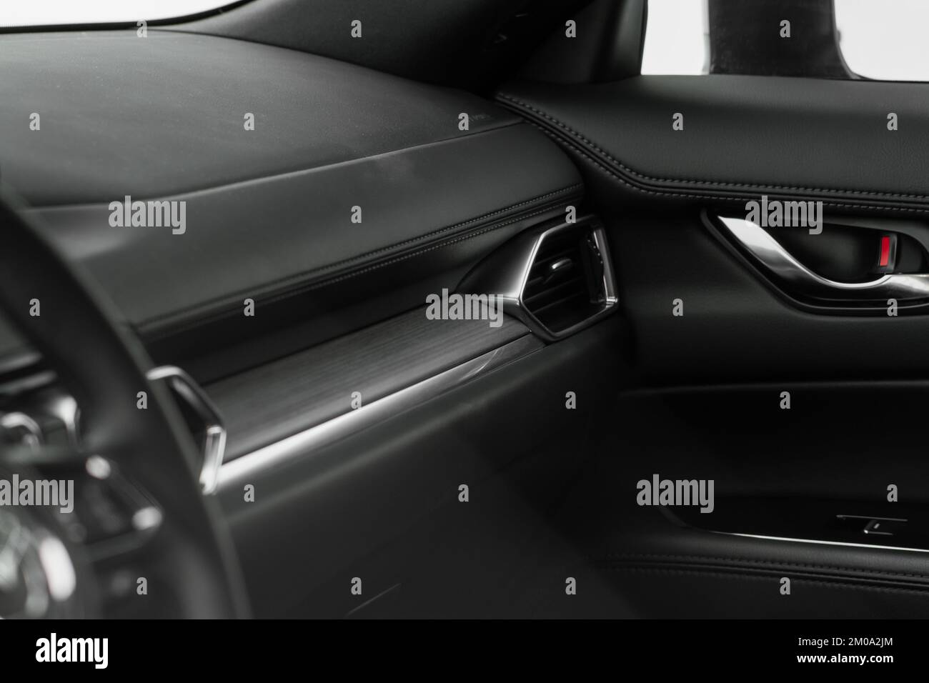 Modern car leather interior details with stitch. Car interior details