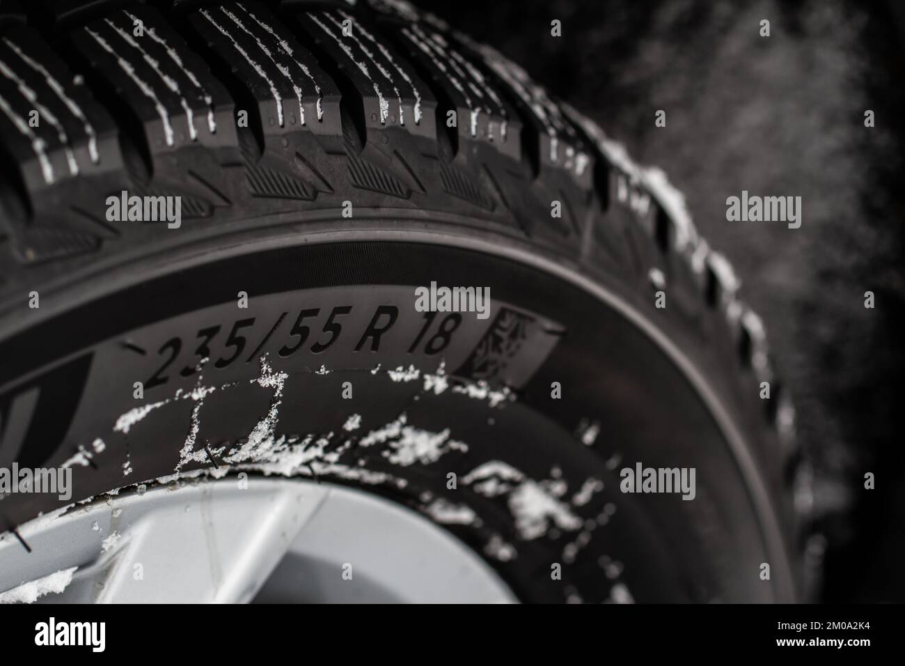 Close up view of tire with tire width, height and wheel diameter