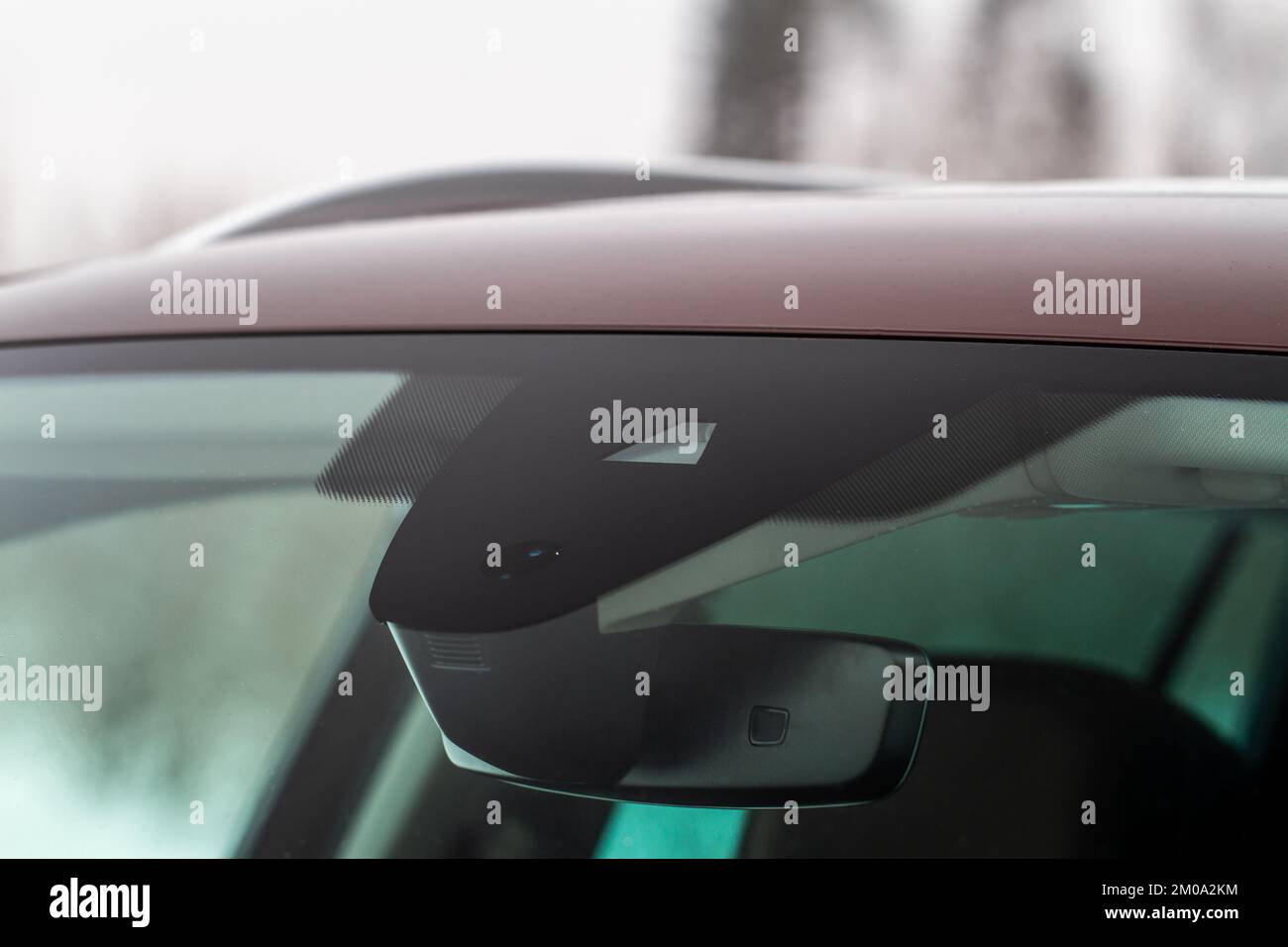 Windshield rain and light sensors of modern car. Car rain sensor Stock