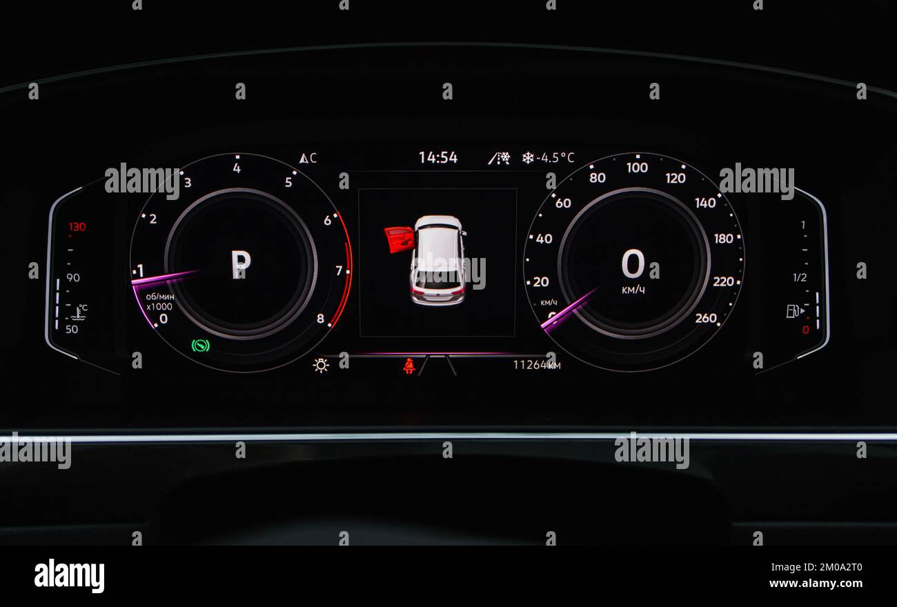 Color detail of an error message on a car dashboard. Door opened alarm