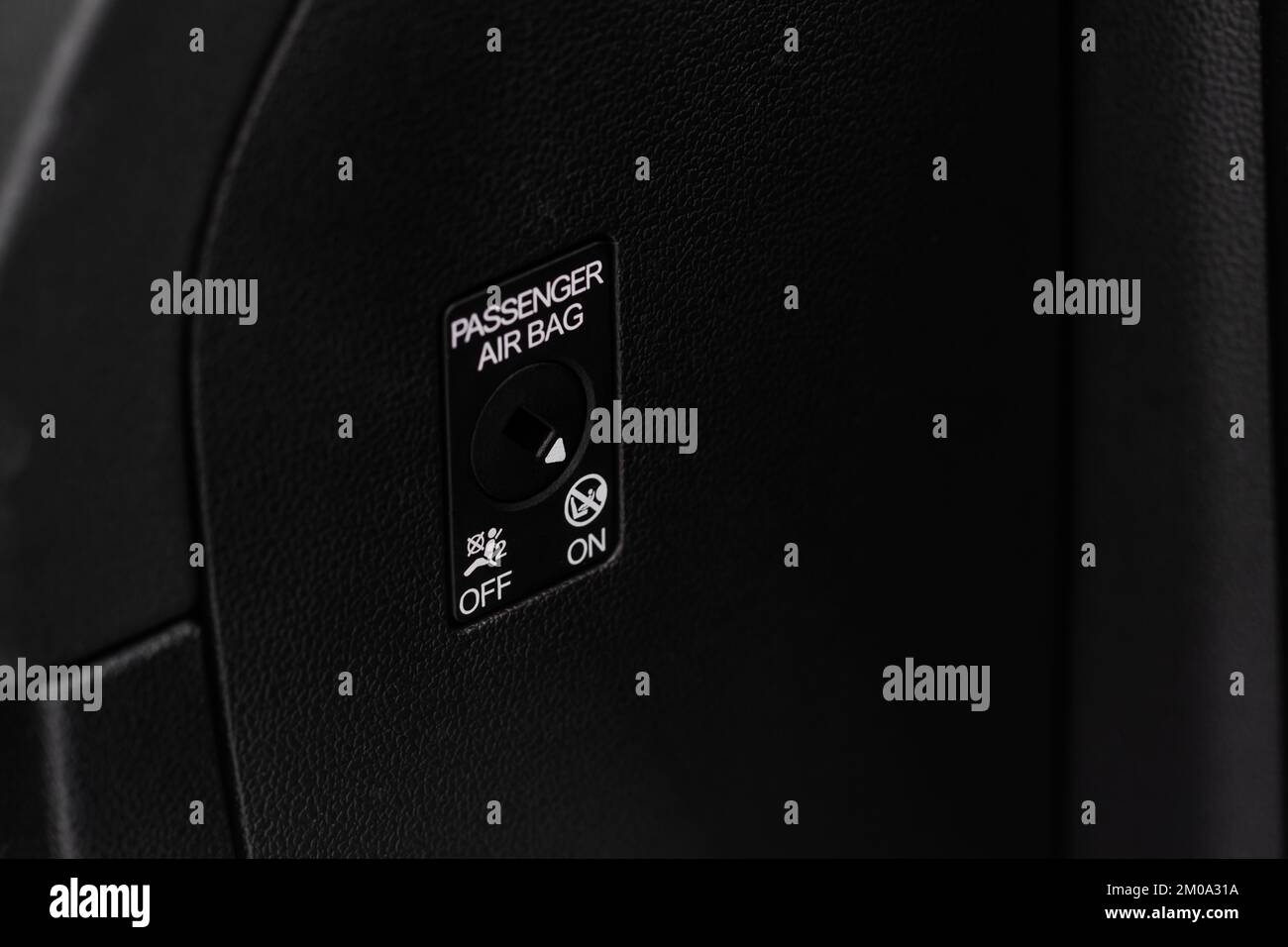 Front passenger airbag on and off switch close up view. Passenger