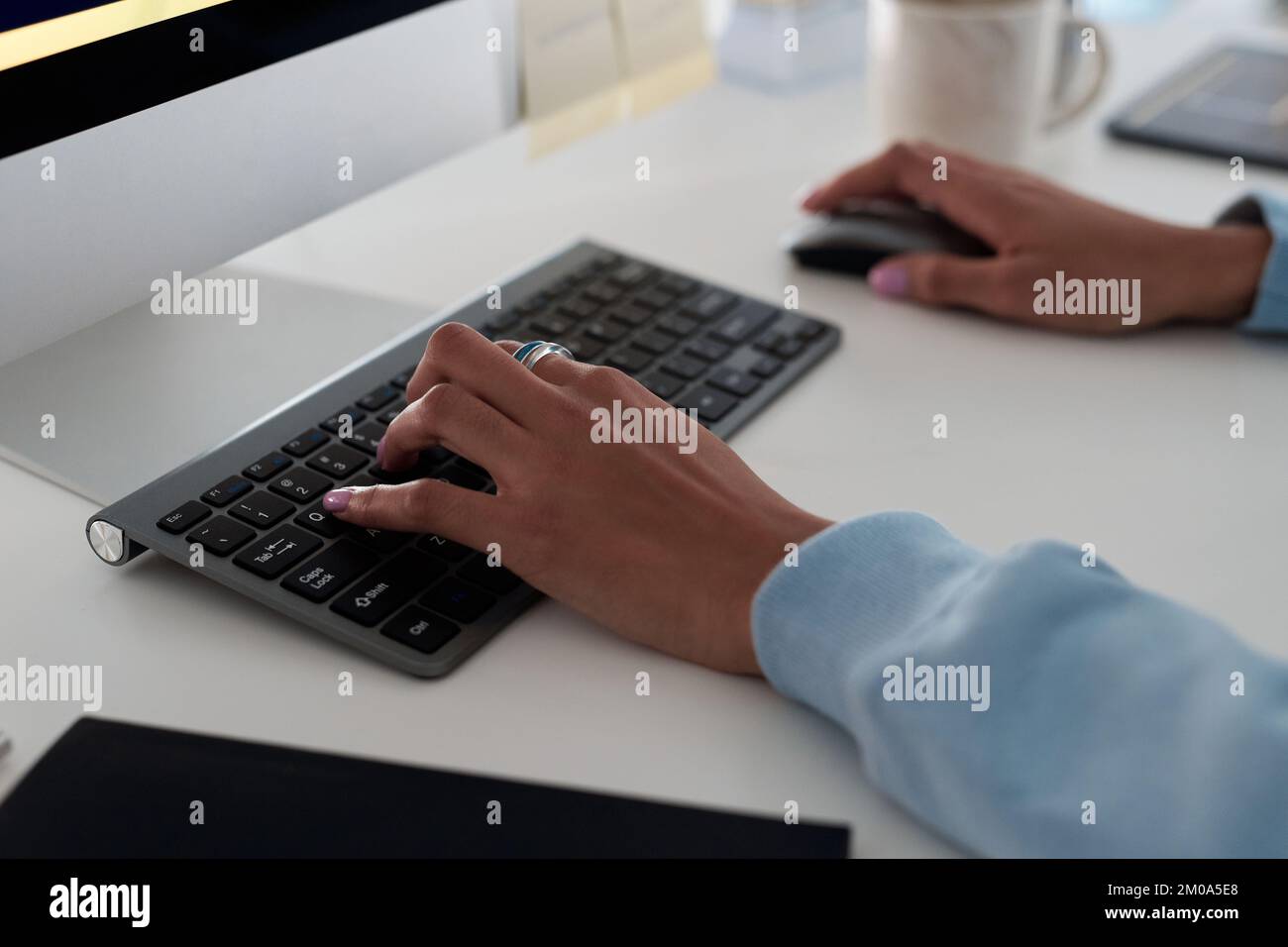Hands of female programmer working on computer, testing code of new app Stock Photo