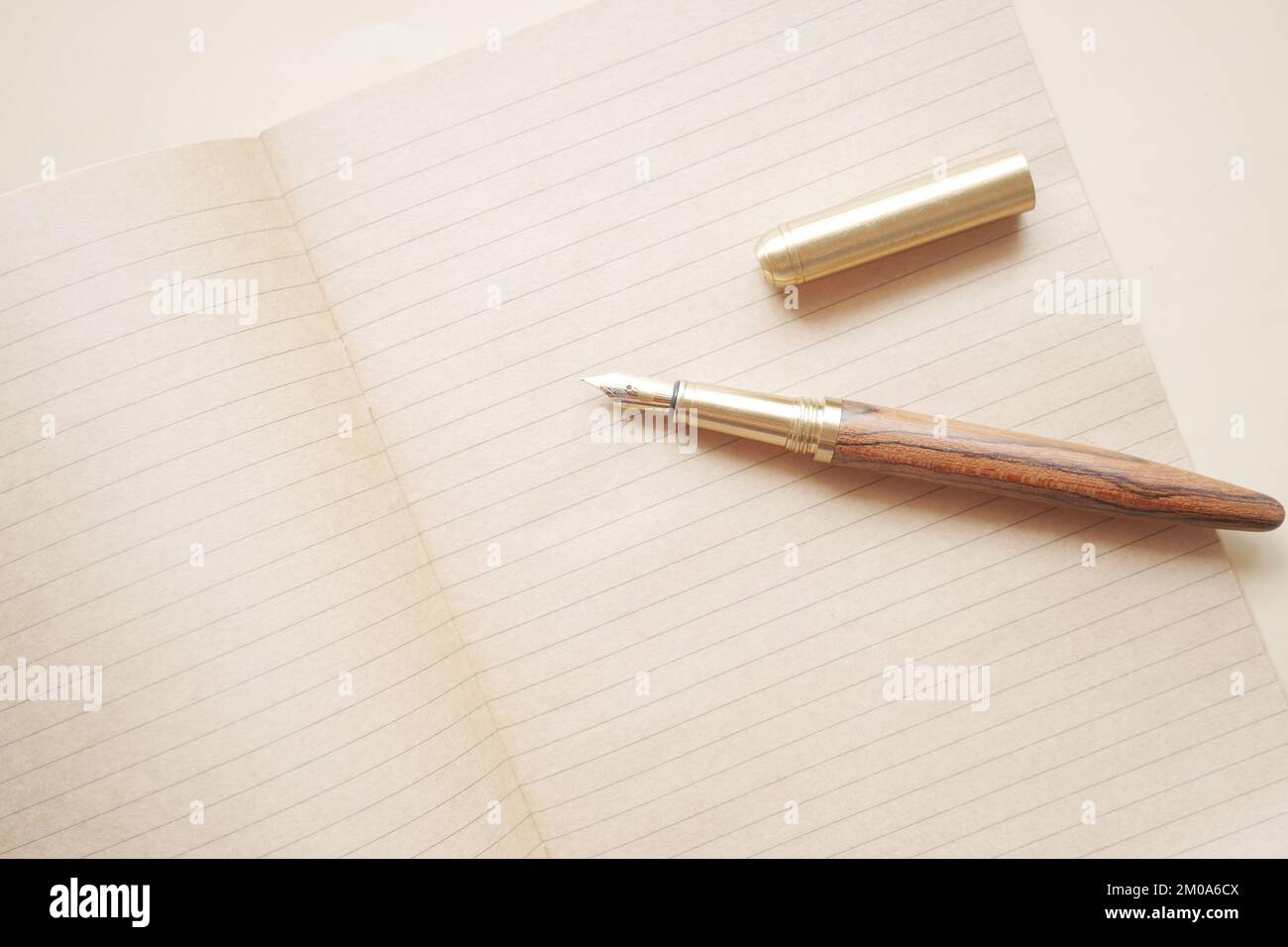 old empty paper and fountain pen on table  Stock Photo
