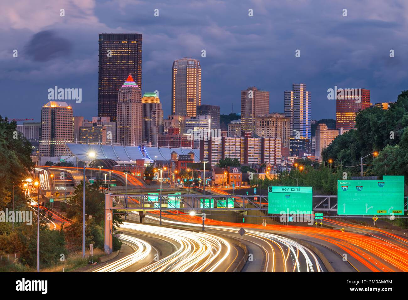 Pittsburgh, Pennsylvania, USA downtown city skyline over looking highways at dusk. Stock Photo
