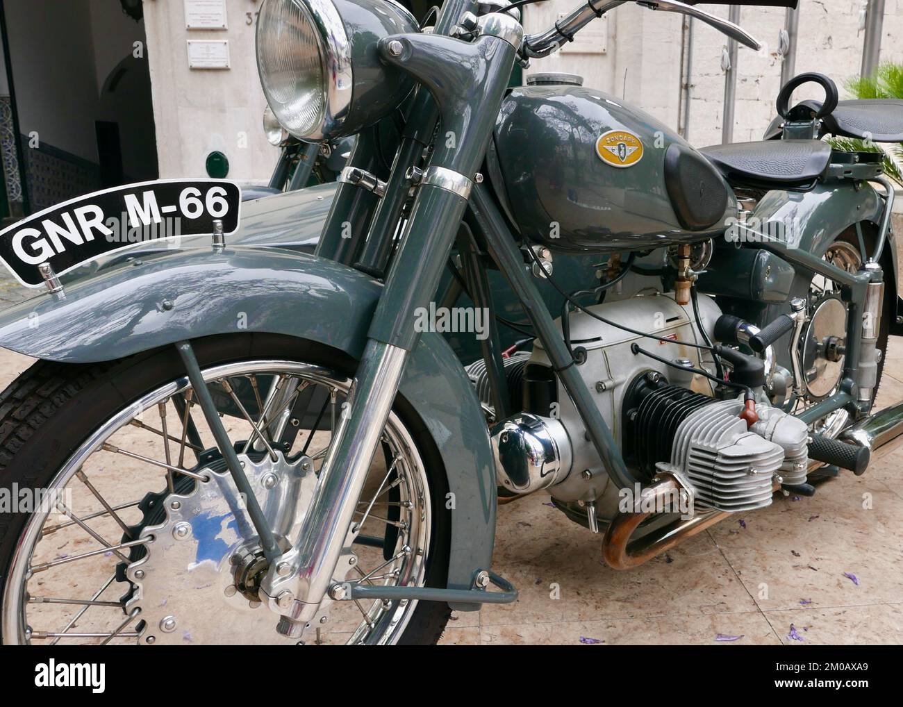 A classic motorcycle parked on the street Stock Photo - Alamy