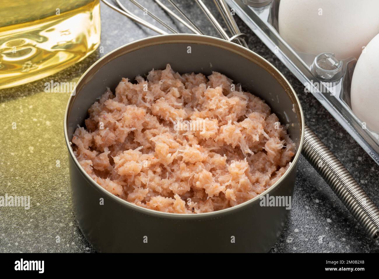 Open tin with canned crabmeat close up as ingredient for a meal Stock Photo