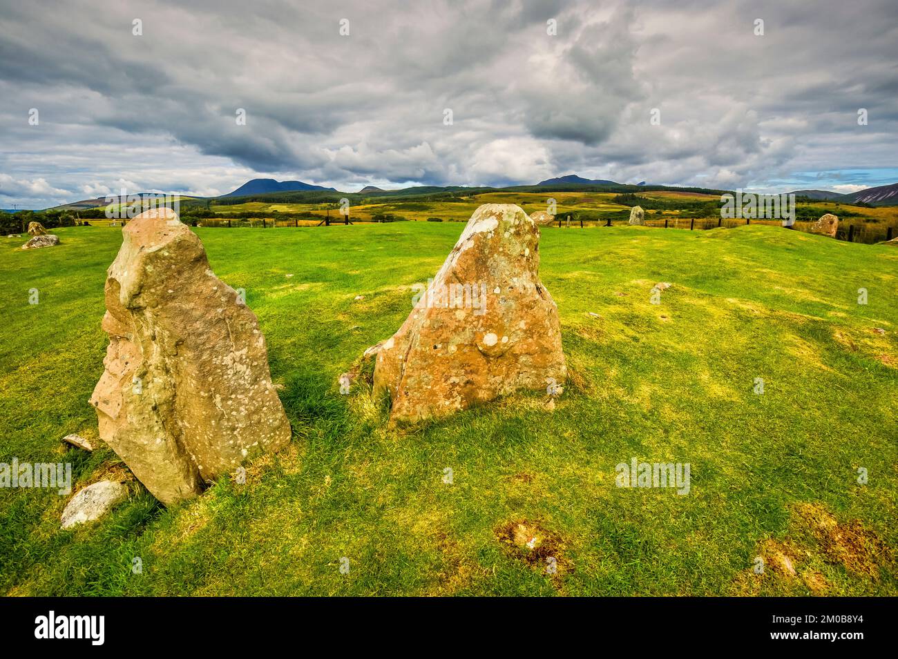 The image is of the Machrie stone circle thought to be around 5000 years old on the Island of Arran Stock Photo