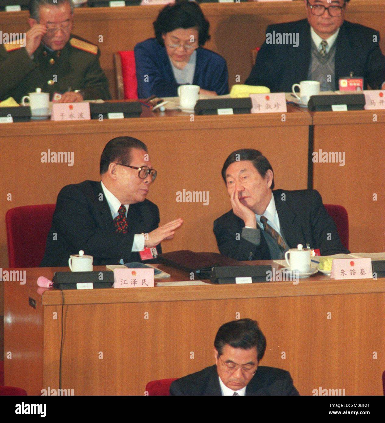 Chinese President Jiang Zemin (L) and new Chinese Premier Zhu Rongji (R) chatting during 9th NPC meeting  ***NOT FOR ADVERTISING USE*** Stock Photo