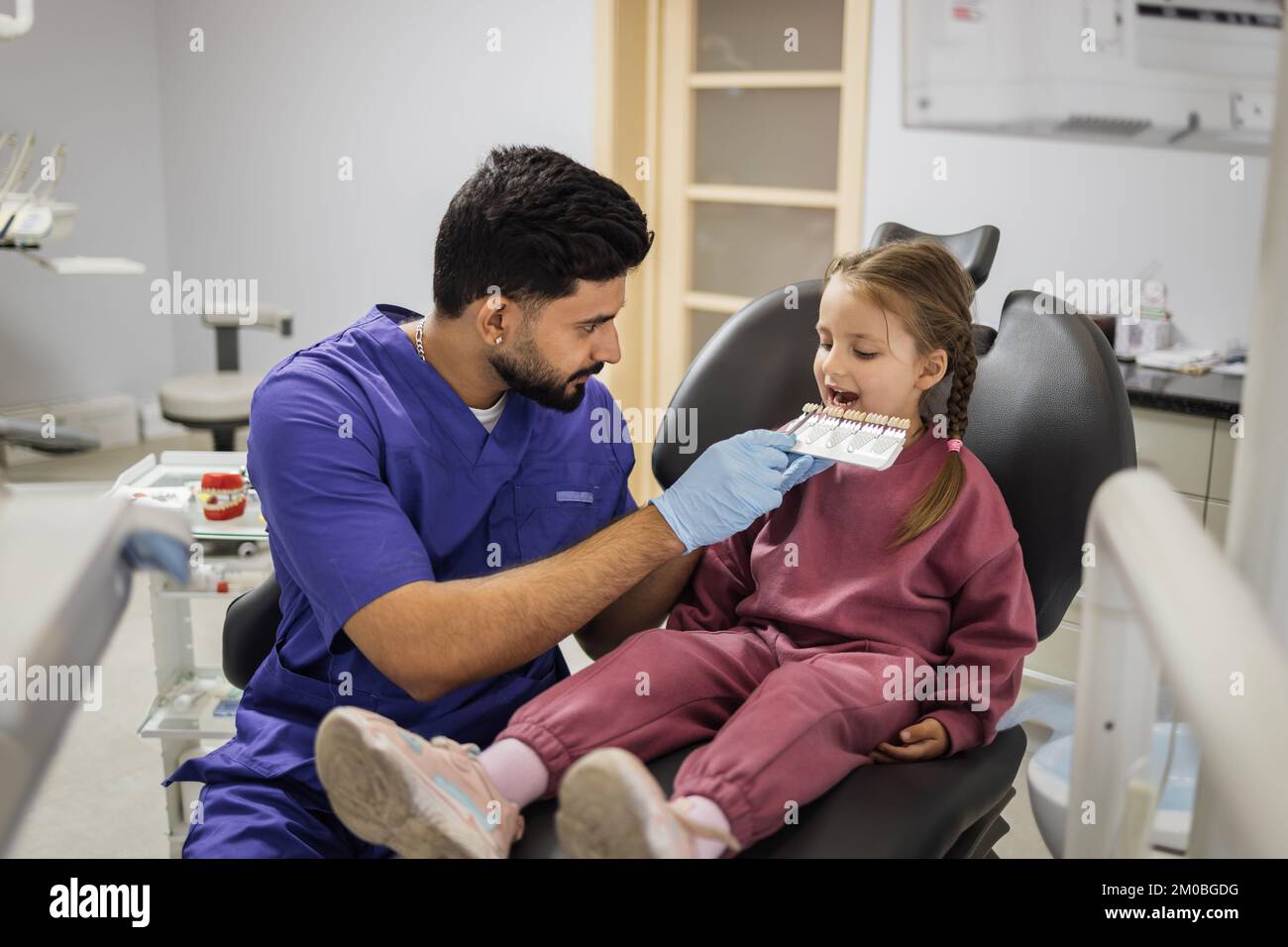 Tooth teeth tone palette. Stomatologist orthodontist male dentist