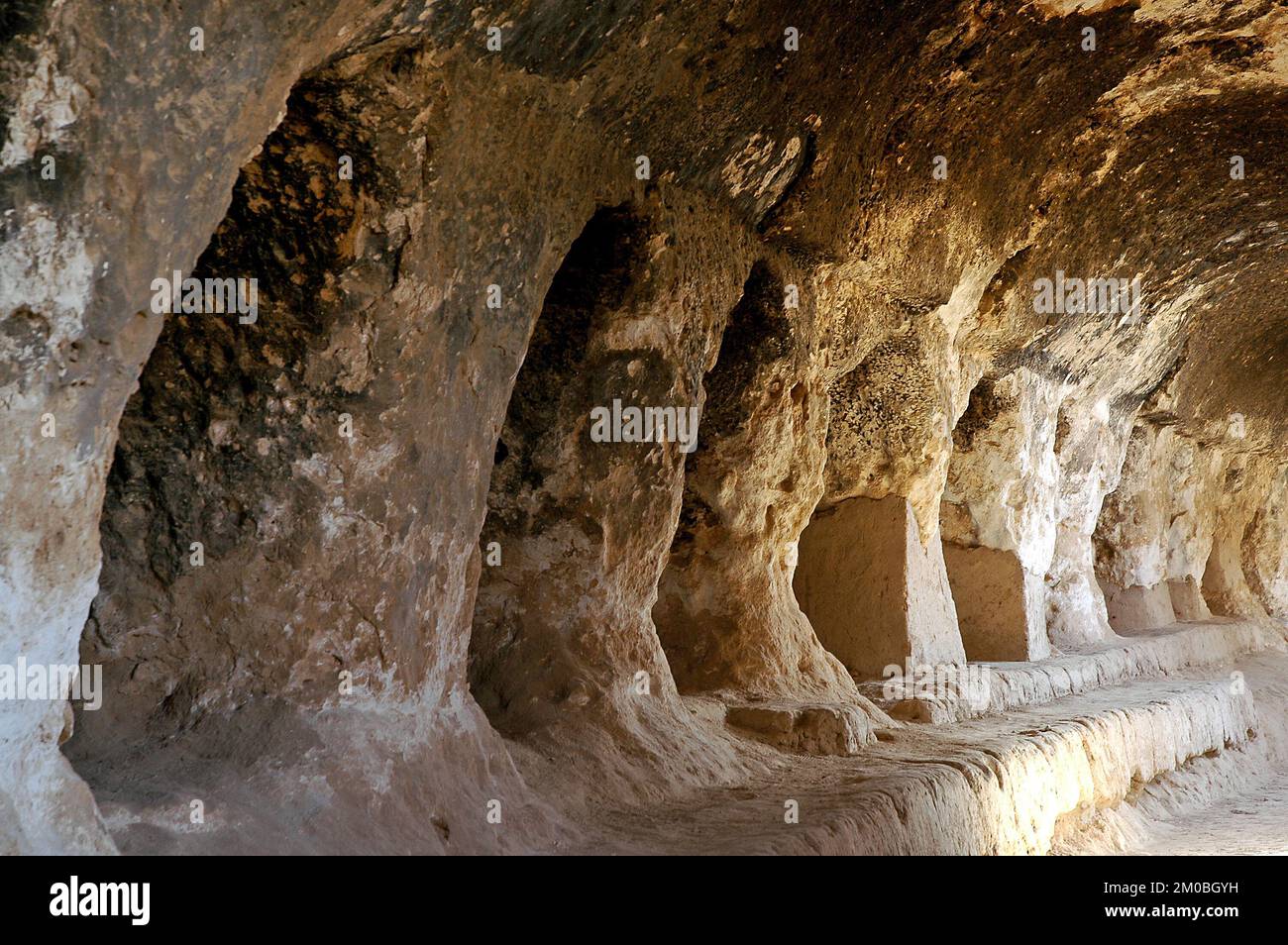 Takht-e Rostam (Takht-e Rustam) is a stupa monastery in northern Afghanistan. Inside the cave monastery showing the cave system. Stock Photo