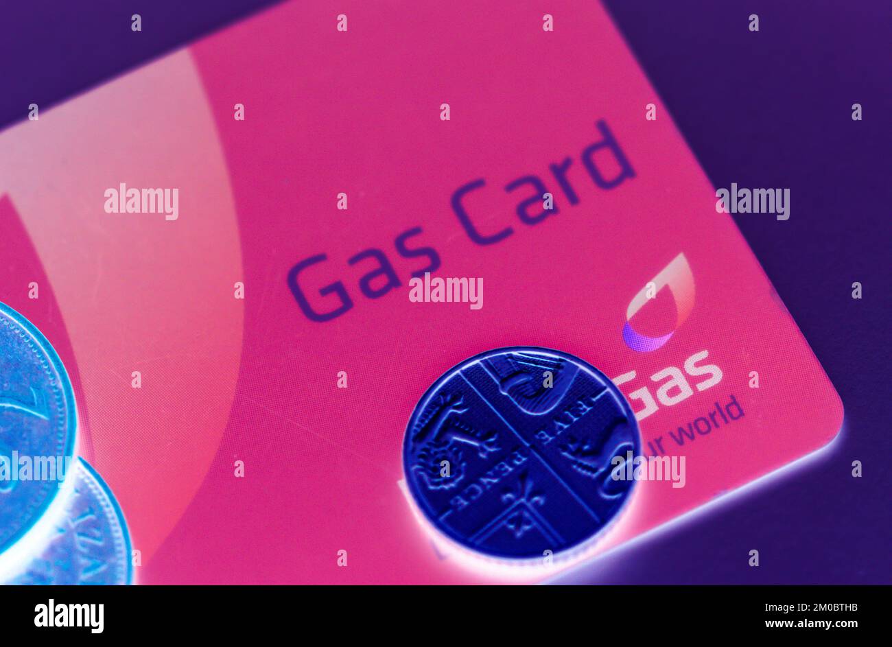 Energy Crisis / Rising Prices / Fuel Poverty - Close-up of a Gas Pre-payment card and British Coins Stock Photo