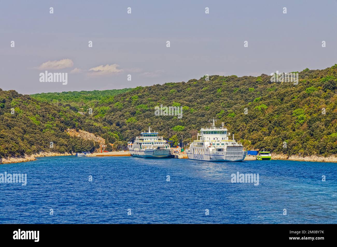 Anchored ferries in Brestova port, Istria Croatia Stock Photo
